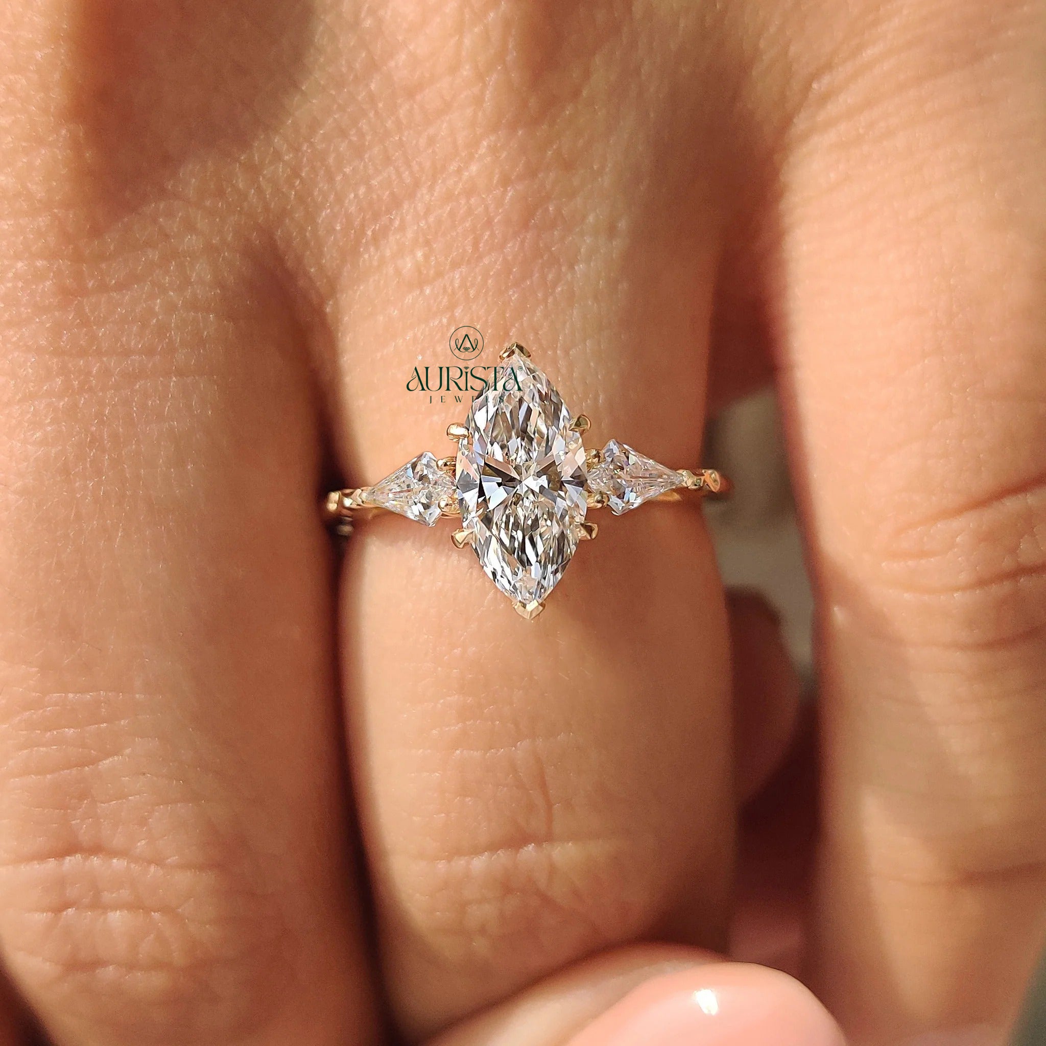 Celestia Marquise Cut Three Stone  with Pear Side Stones