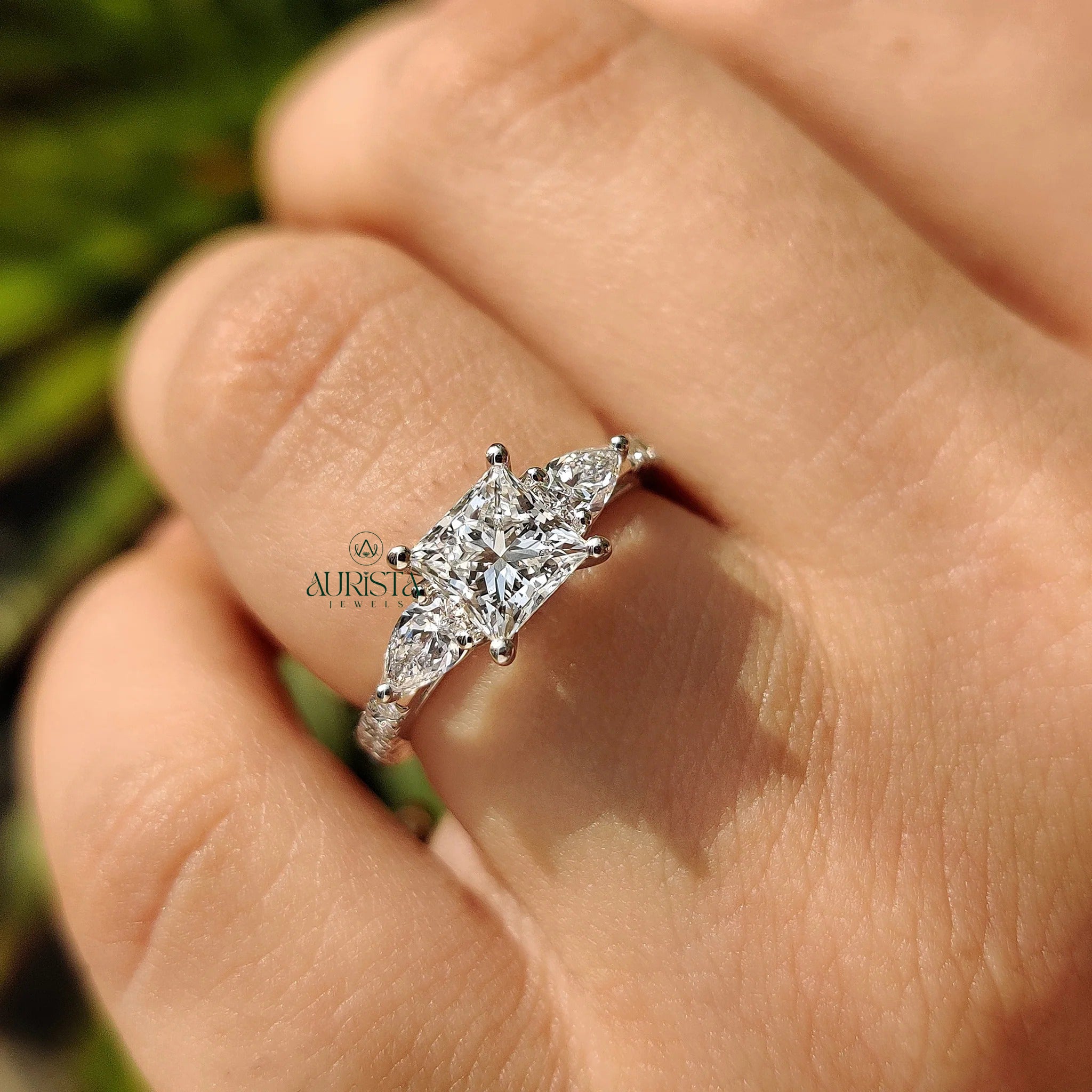 Royal Princess Cut Ring with Dazzling Side Stone Elegance