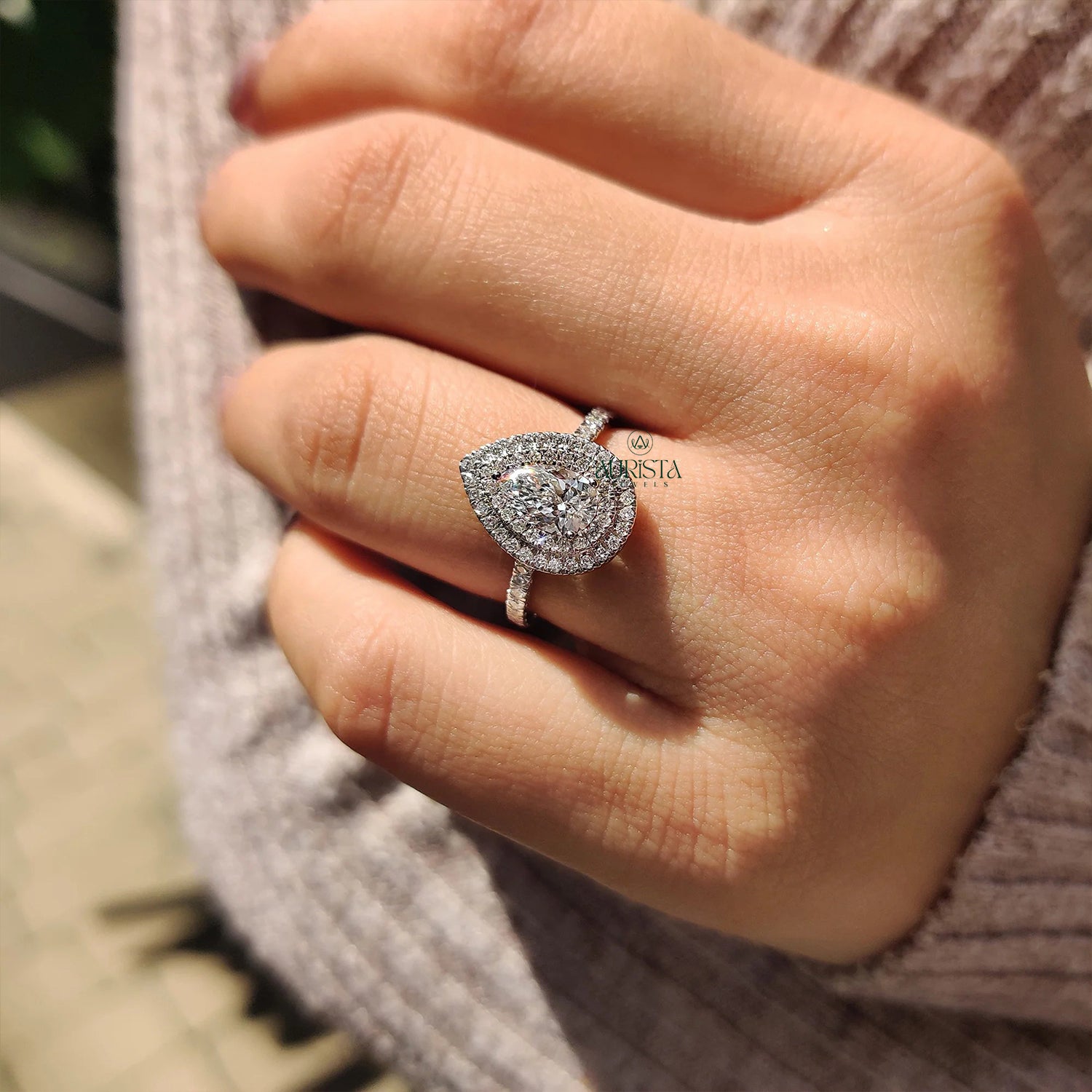 Elegant Pear Cut Ring with Sparkling Side Stones