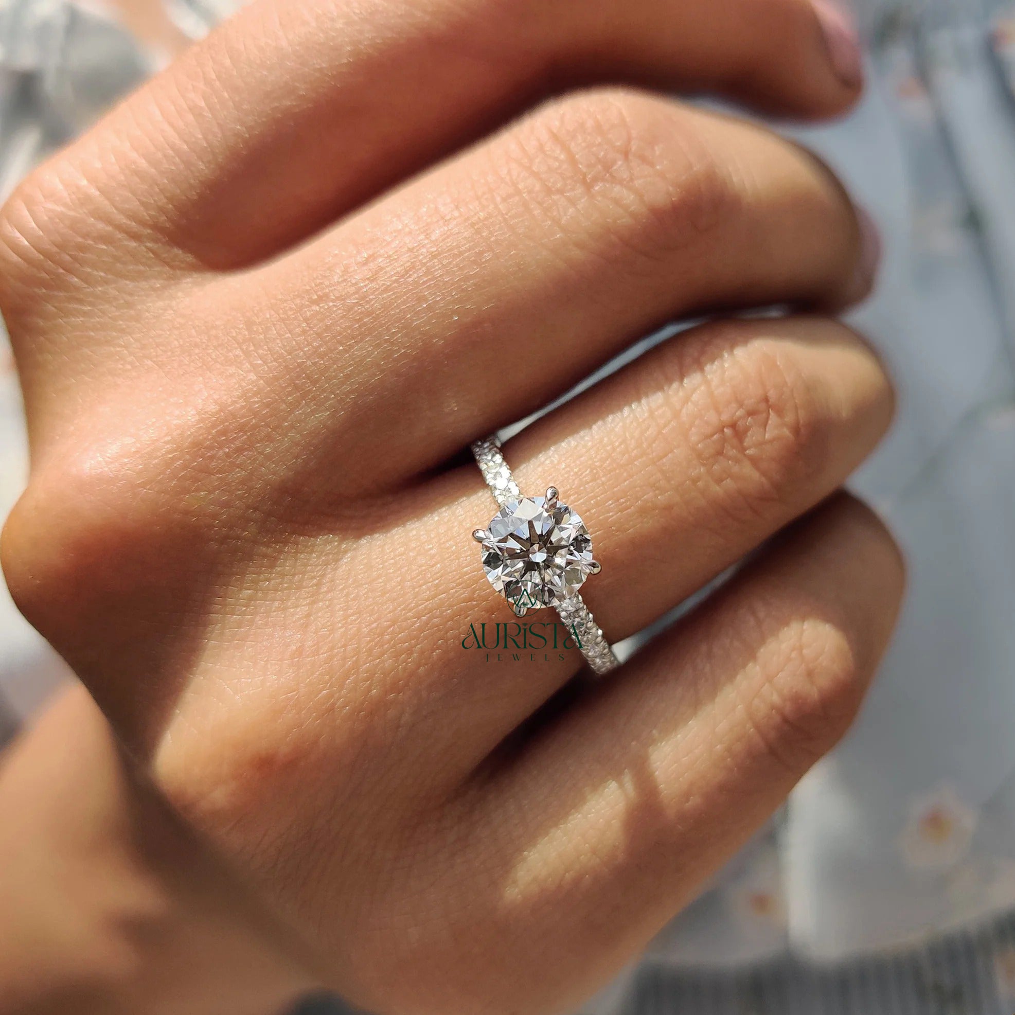Brilliant Round Cut Diamond Ring with Sparkling Pave Band