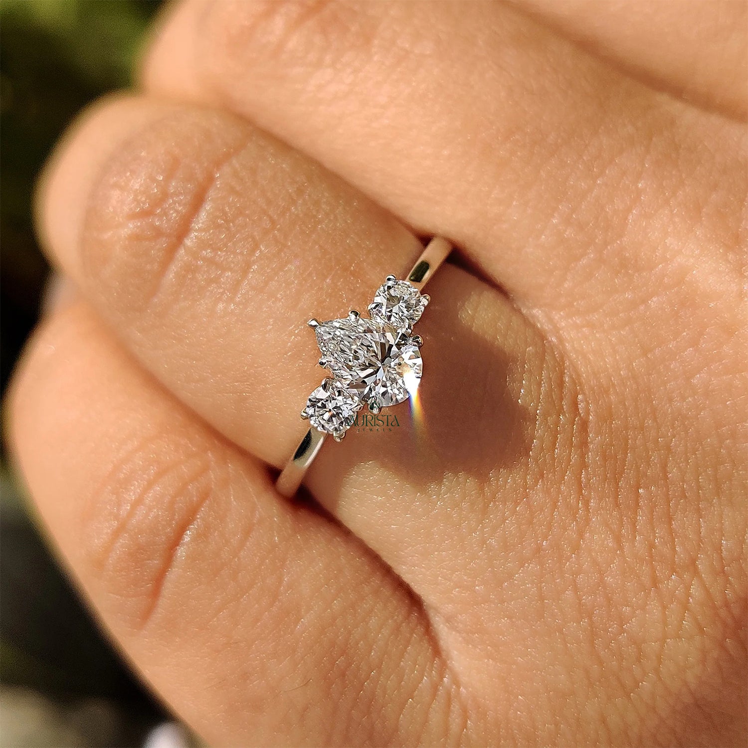 Aurelia Pear Cut Diamond Three Stone Ring