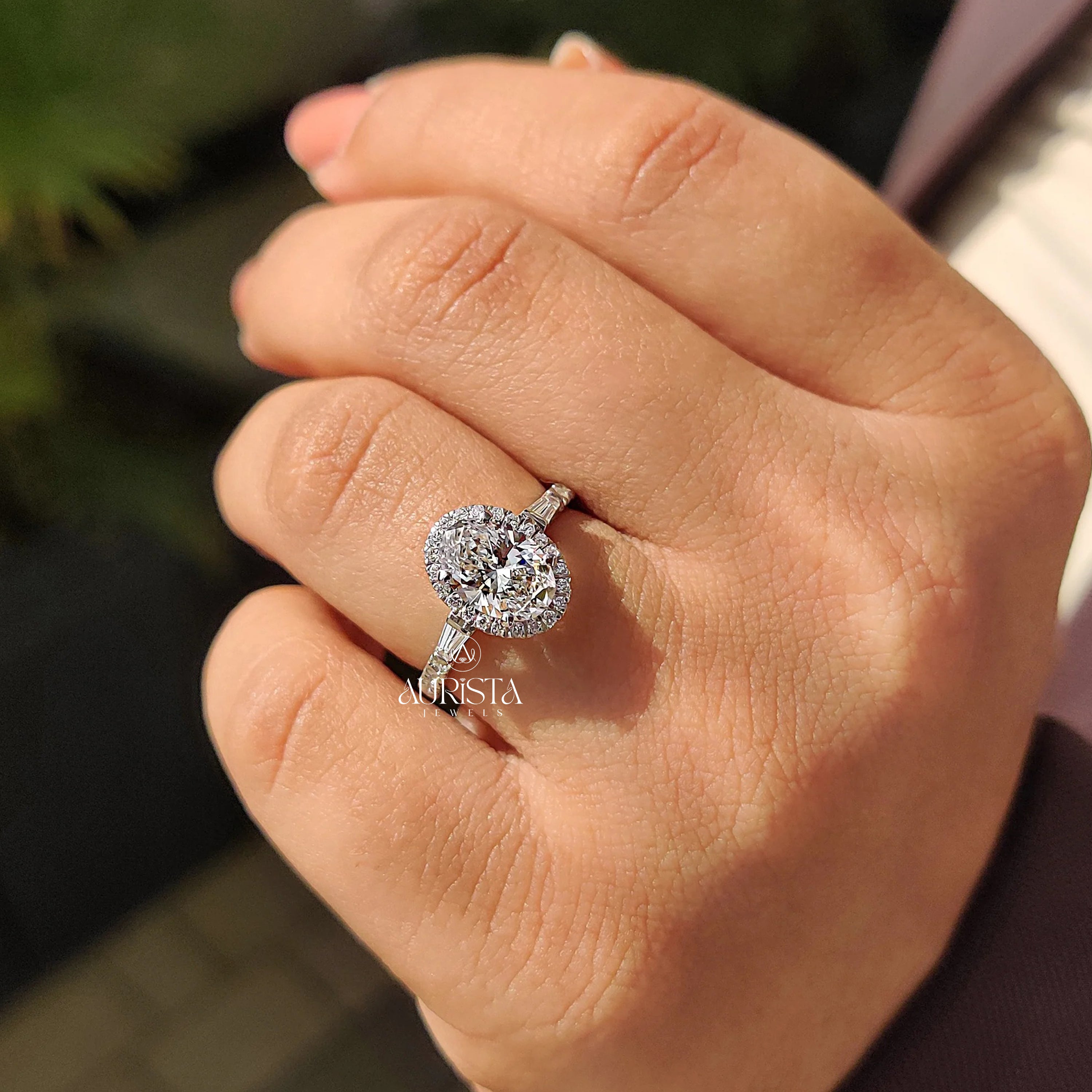 Oval Cut Diamond Ring with Baguette Side Stones
