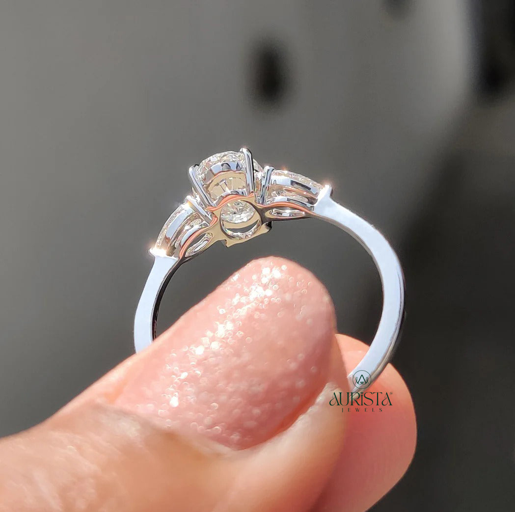 Royal Oval Cut Three Stone Ring with Brilliant Side Diamond