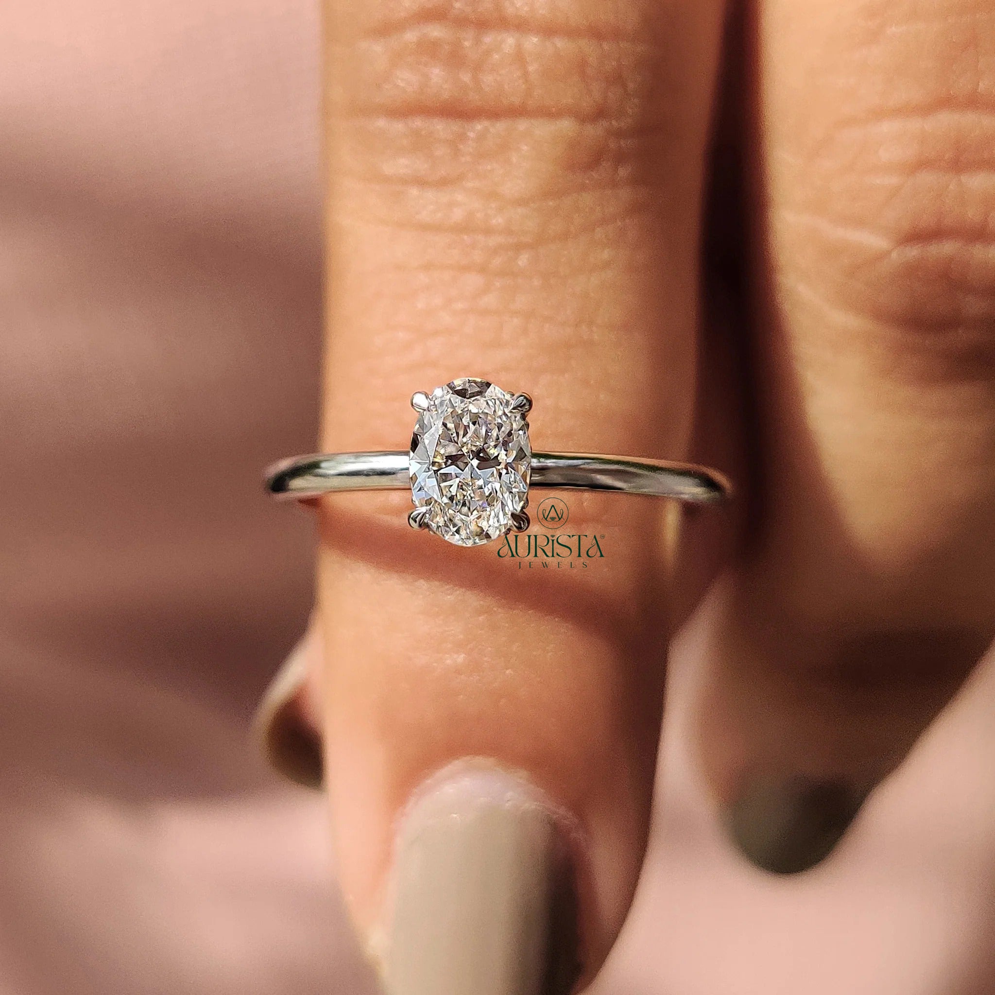 Oval Cut Diamond Four Prong Solitaire Ring with Hidden Halo