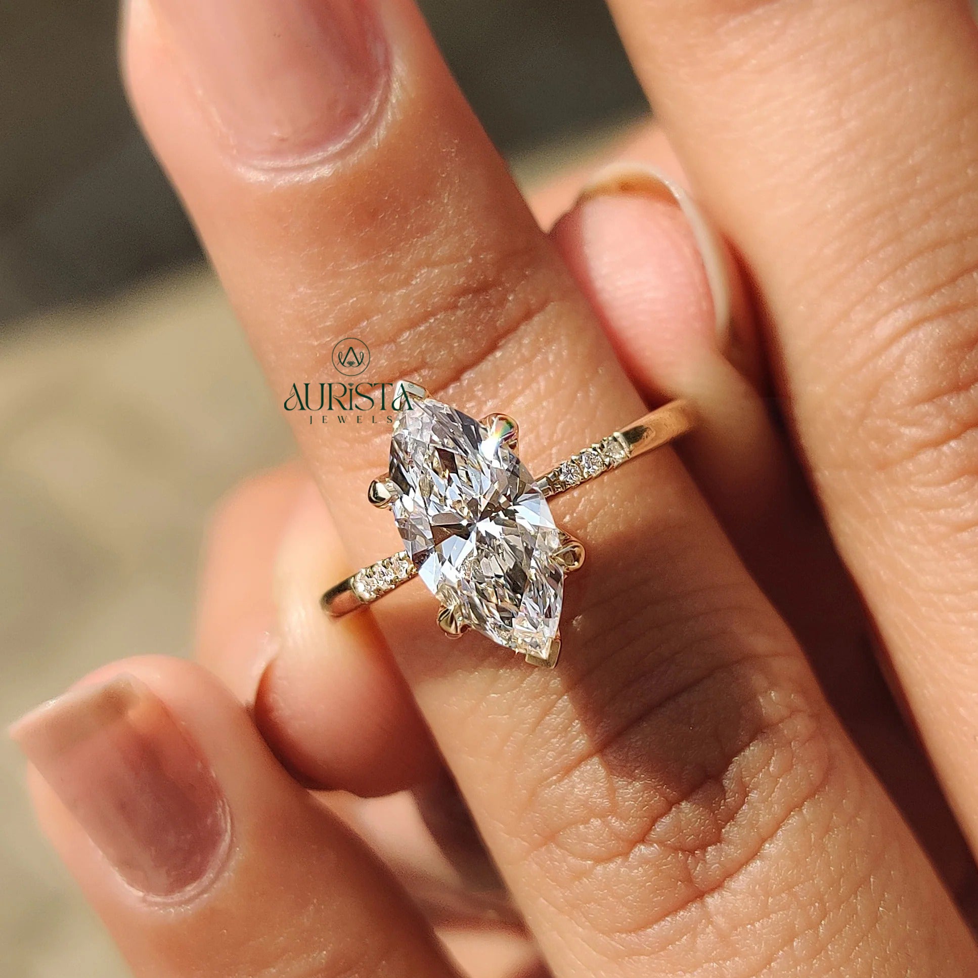 Marquise Cut Diamond Ring with Pave Side Stones