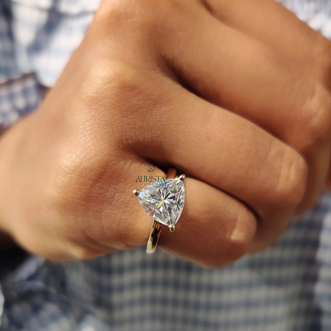 Trillion Cut Moissanite Solitaire Engagement Ring in Polished Yellow Gold Band