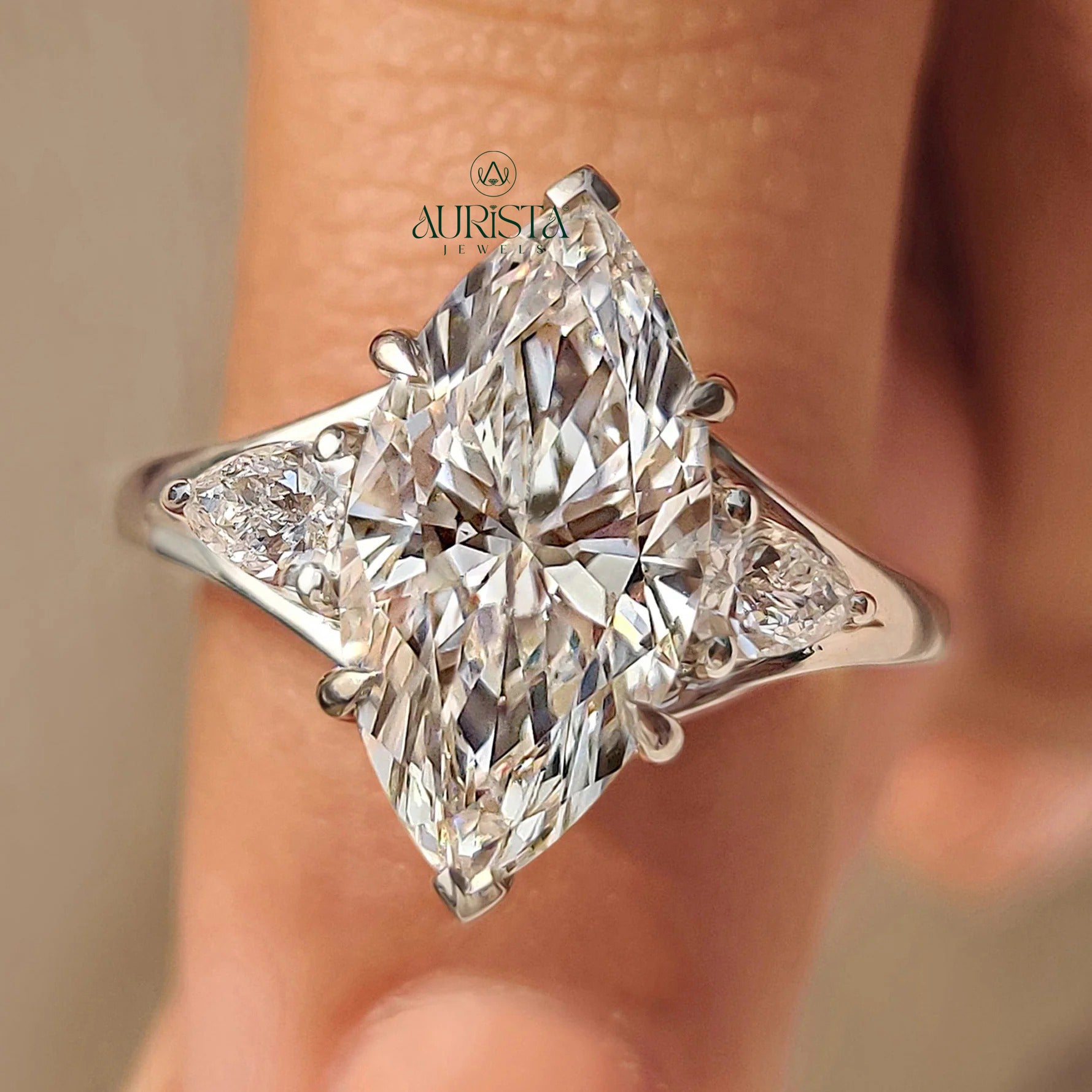 Marquise Cut Three Stone Diamond Ring with Pear Side Stones