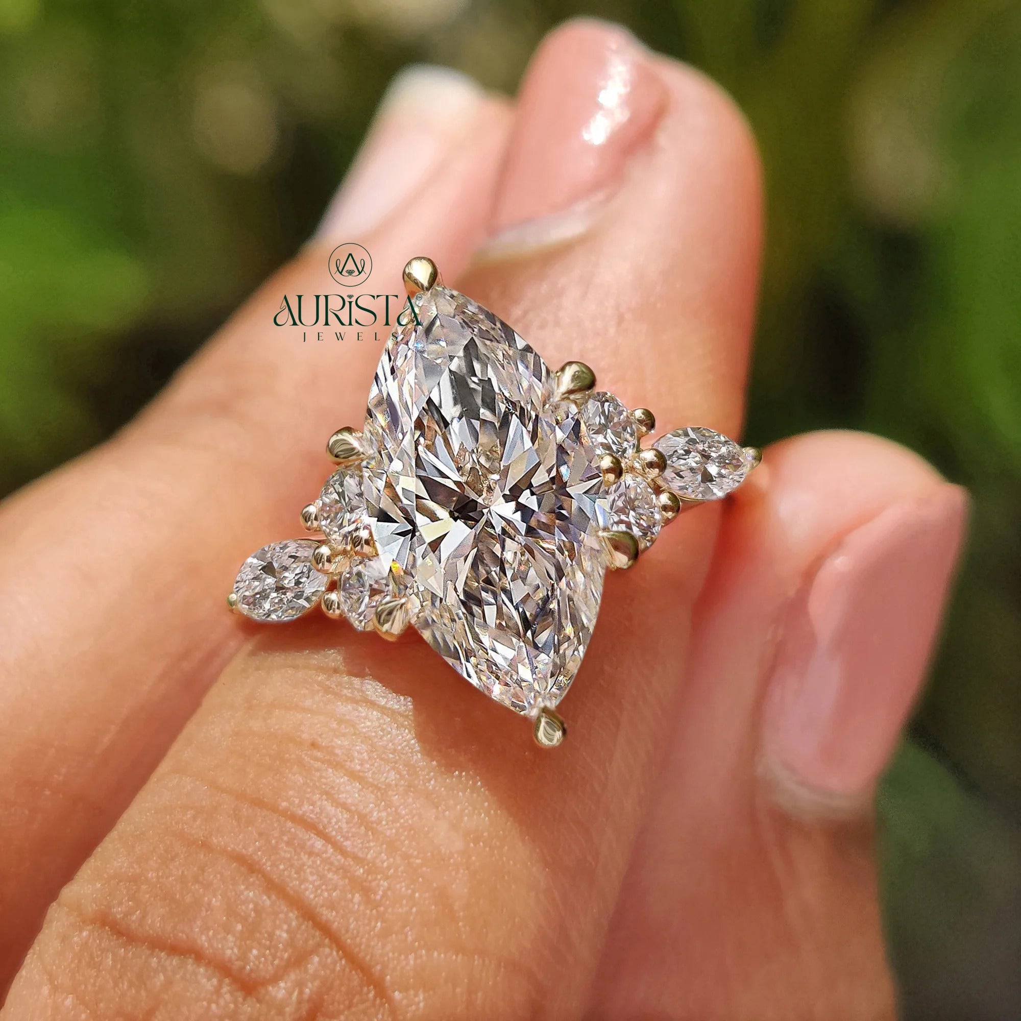 Marquise Cut Diamond Ring with Royal Cluster Side Stones