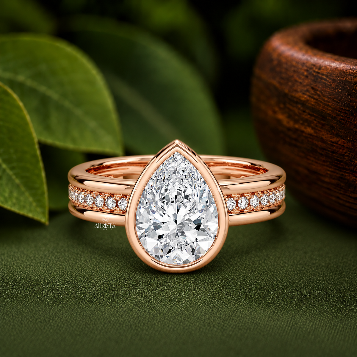 Pear Moissanite Diamond Ring, Bezel Set Rose Gold With Pave Round Side Stones