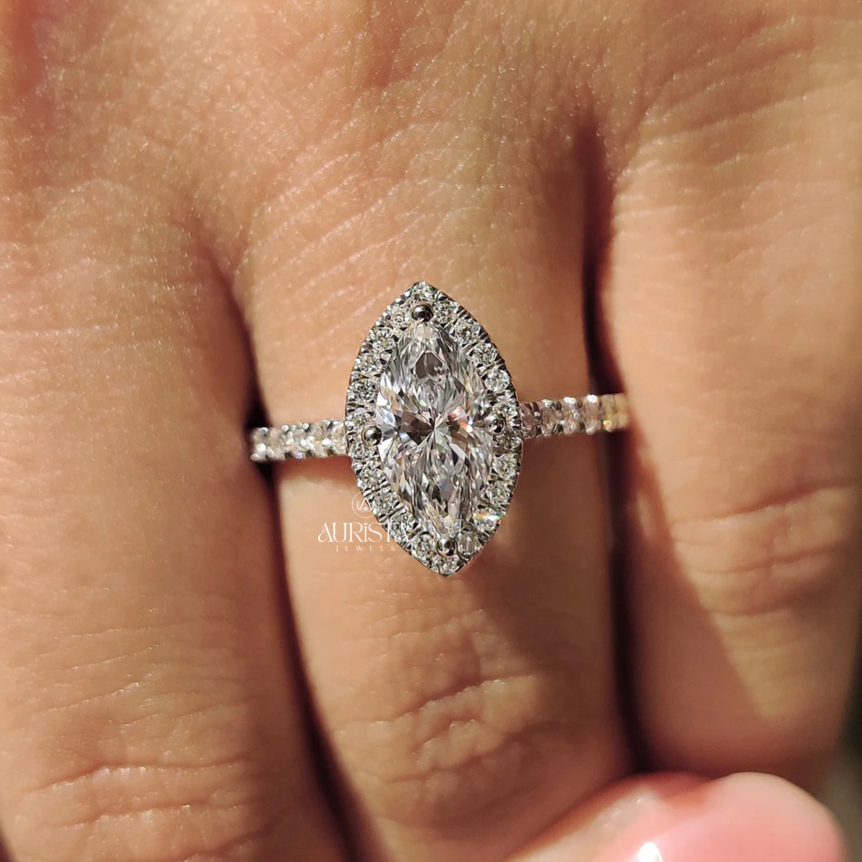 The Luminous Marquise: Diamond Halo Statement Ring with Pave Band