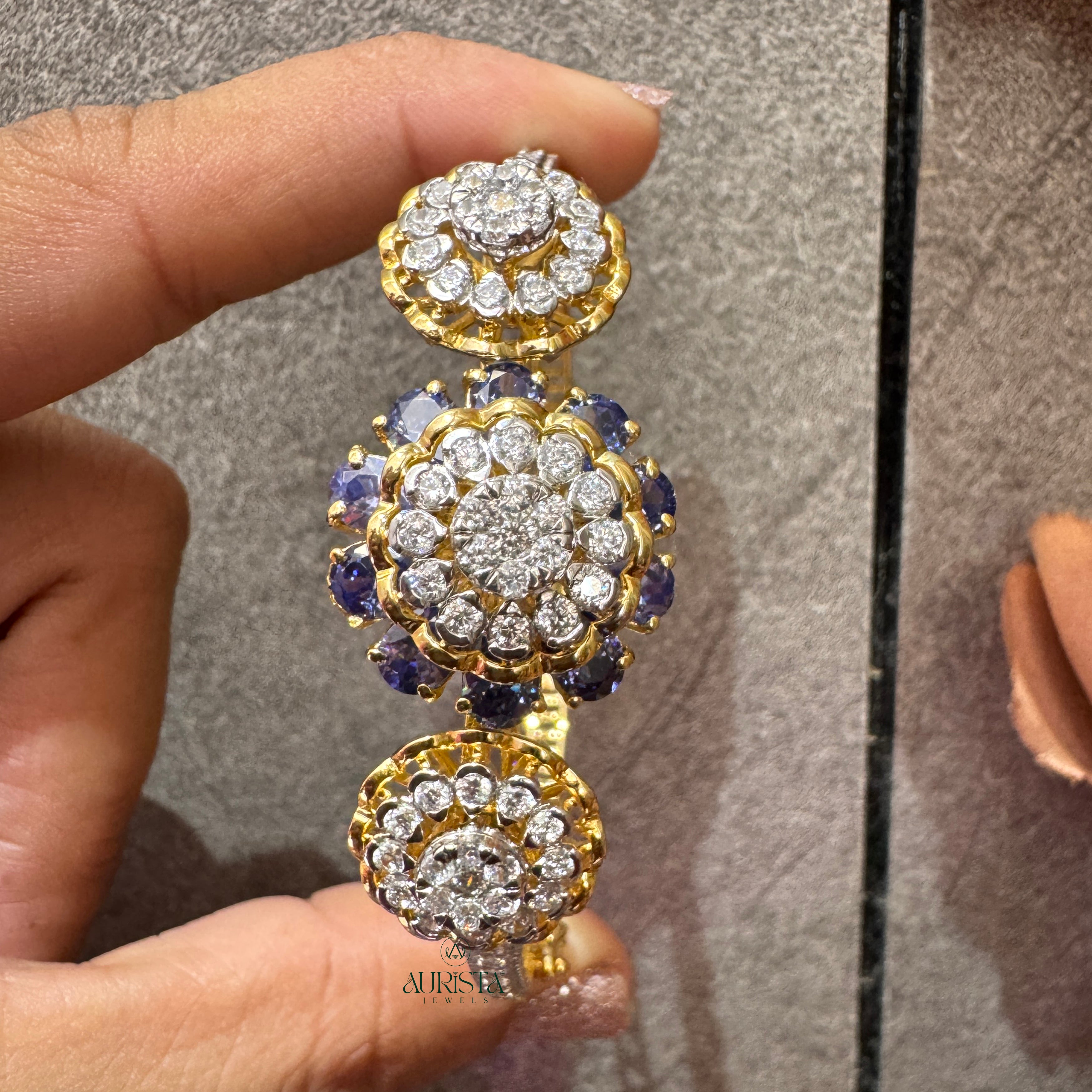 Sparkling Emerald Bloom Designer Bracelet
