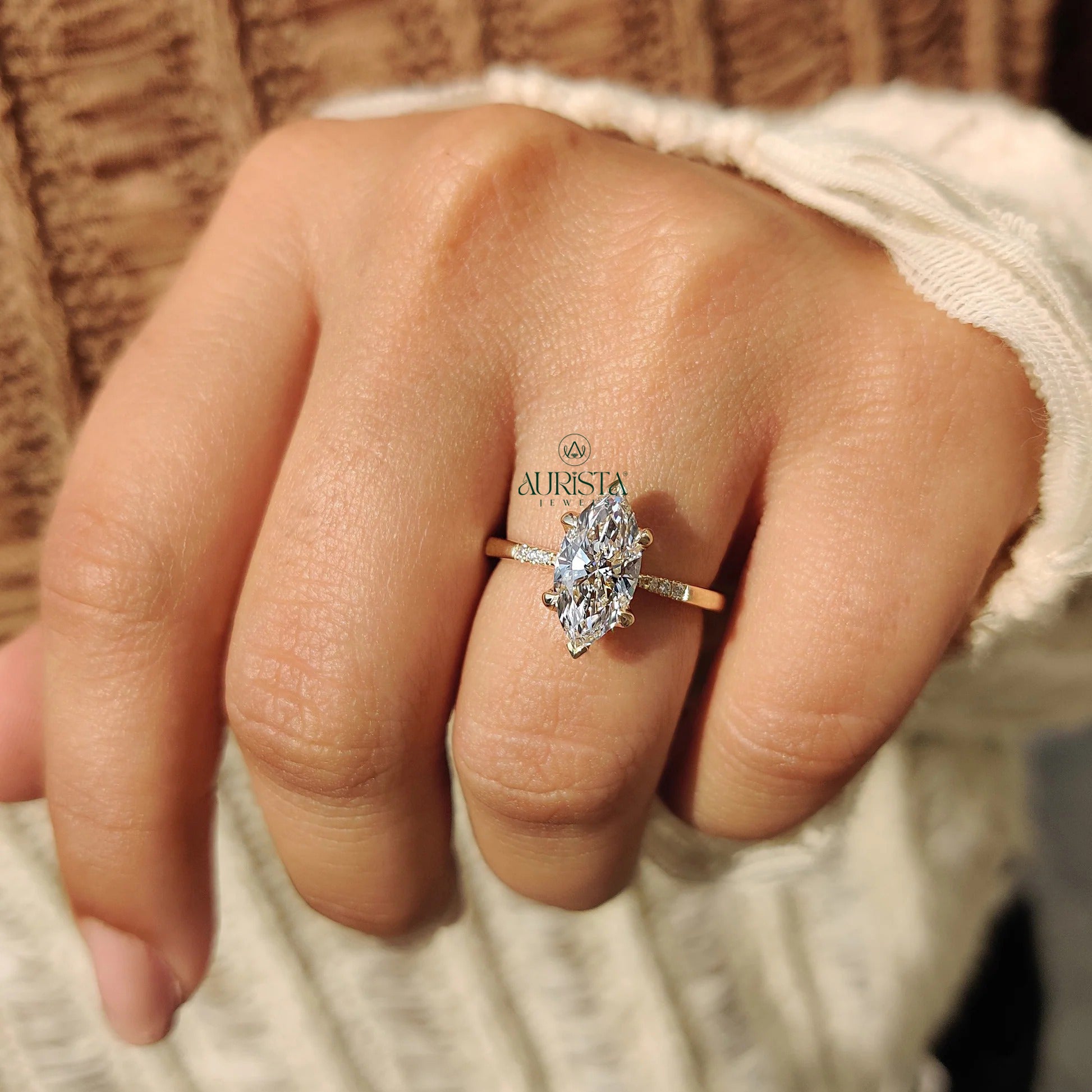 Marquise Cut Diamond Ring with Pave Side Stones
