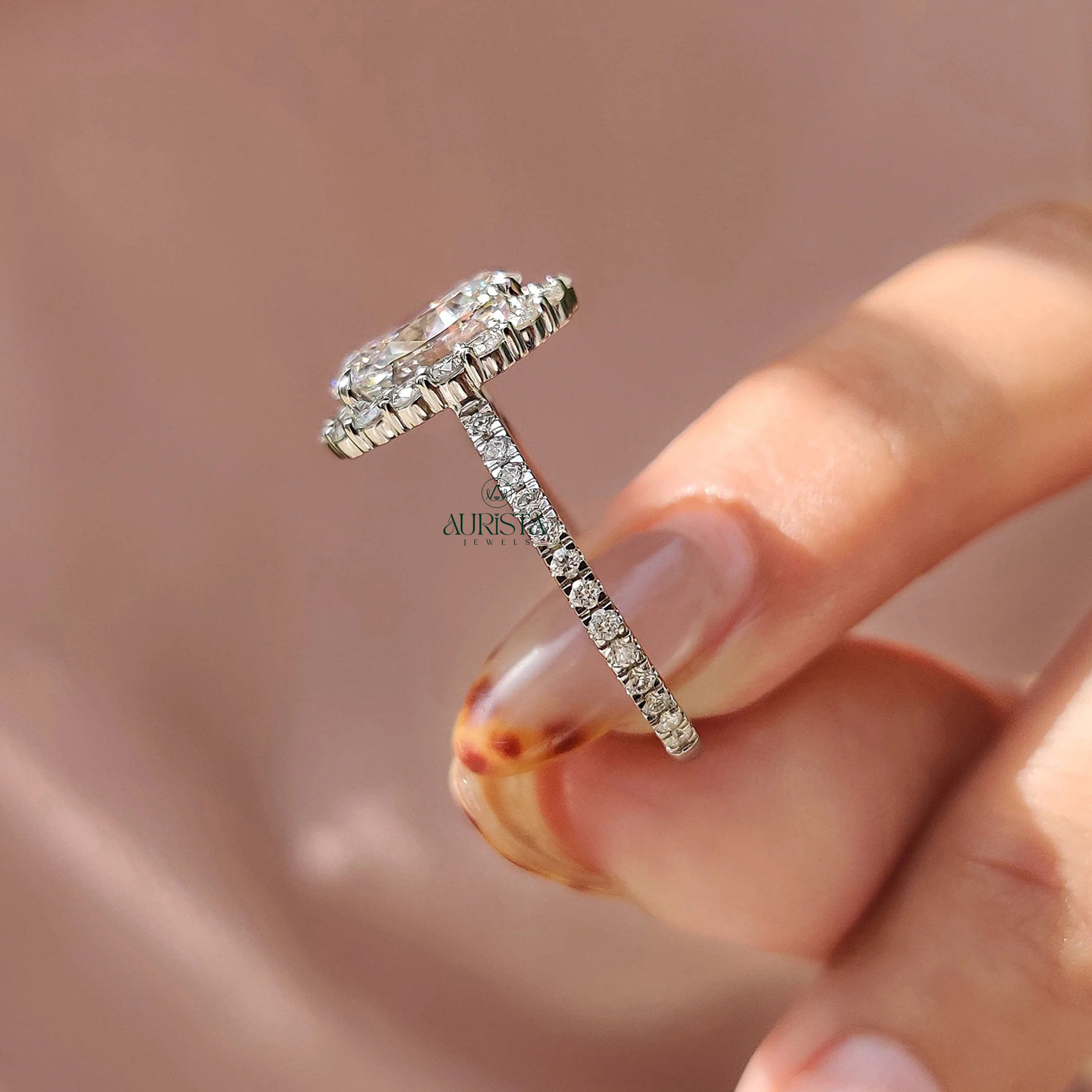 Oval Cut Diamond Halo Ring with Twisted Infinity Band