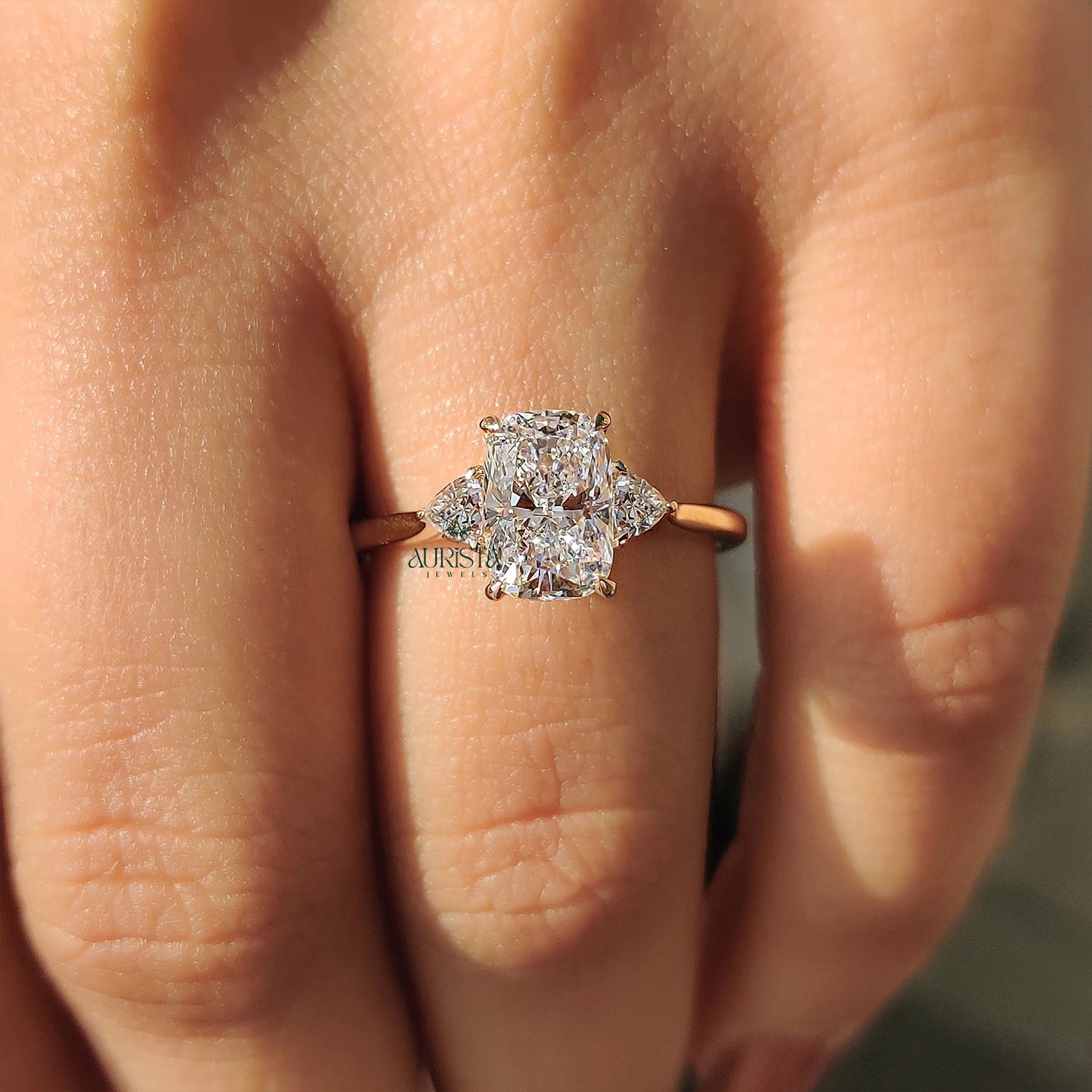Celestique Cushion Cut Diamond Ring with Trillion Side Stones