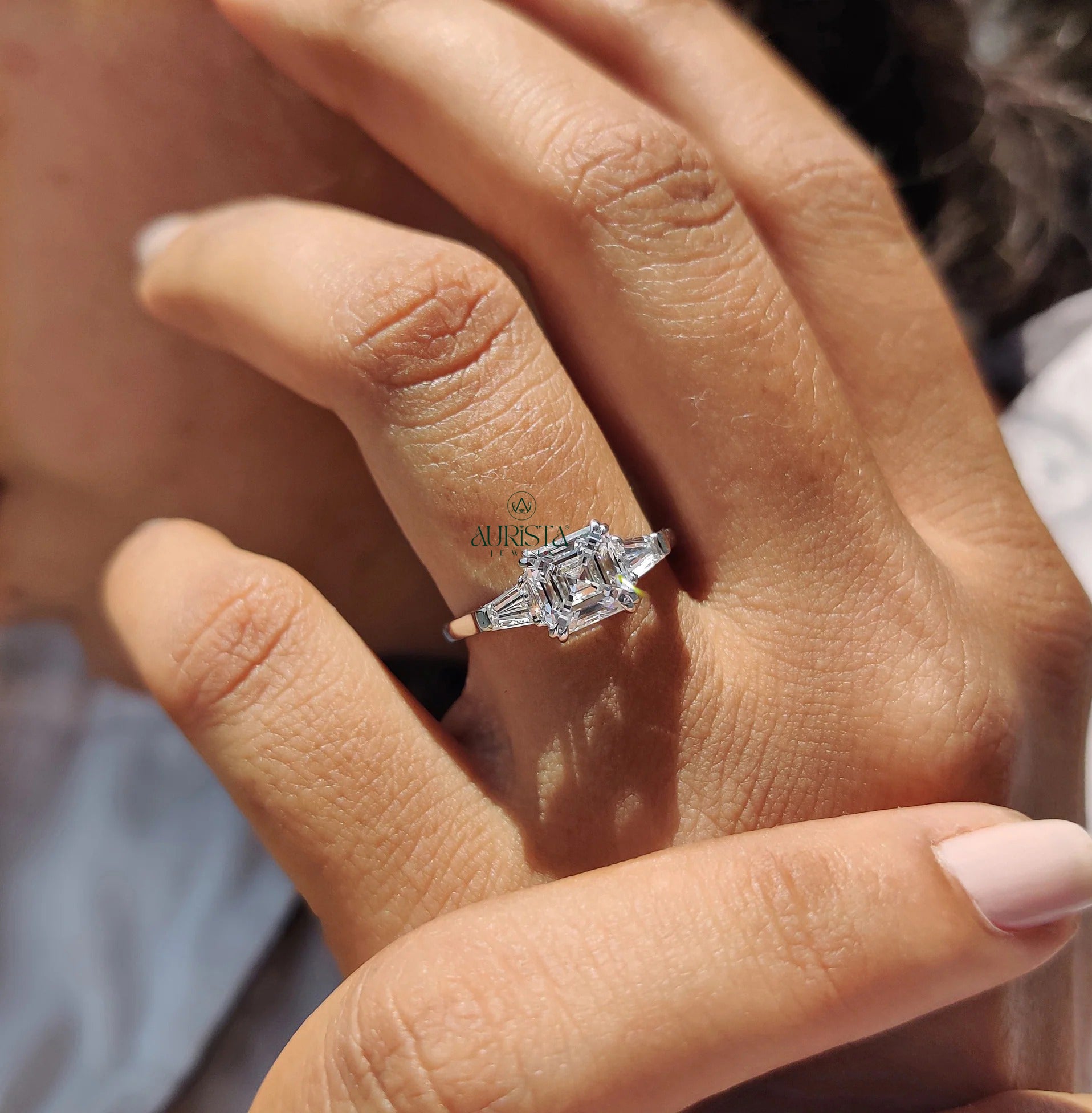 Asscher Cut Center with Tapered Baguette Side Stones