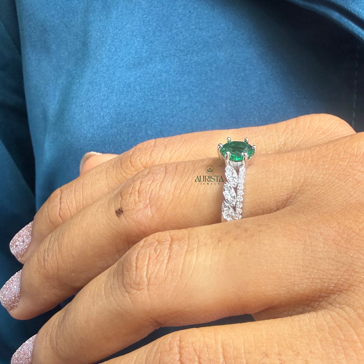 Leaf Design Ring Featuring a Green Center Stone and Sparkling White Moissanite