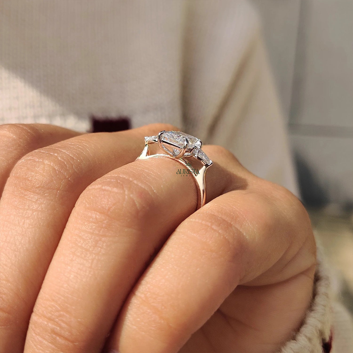 Aurelia Radiant Cut Three Stone Ring with Pear Side Stone Elegance