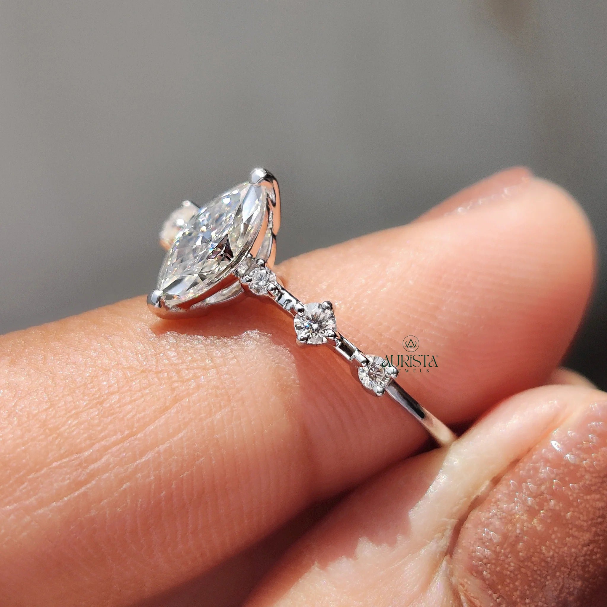 Marquise Moissanite Engagement Ring with Diamond Side Stones in White Gold Band