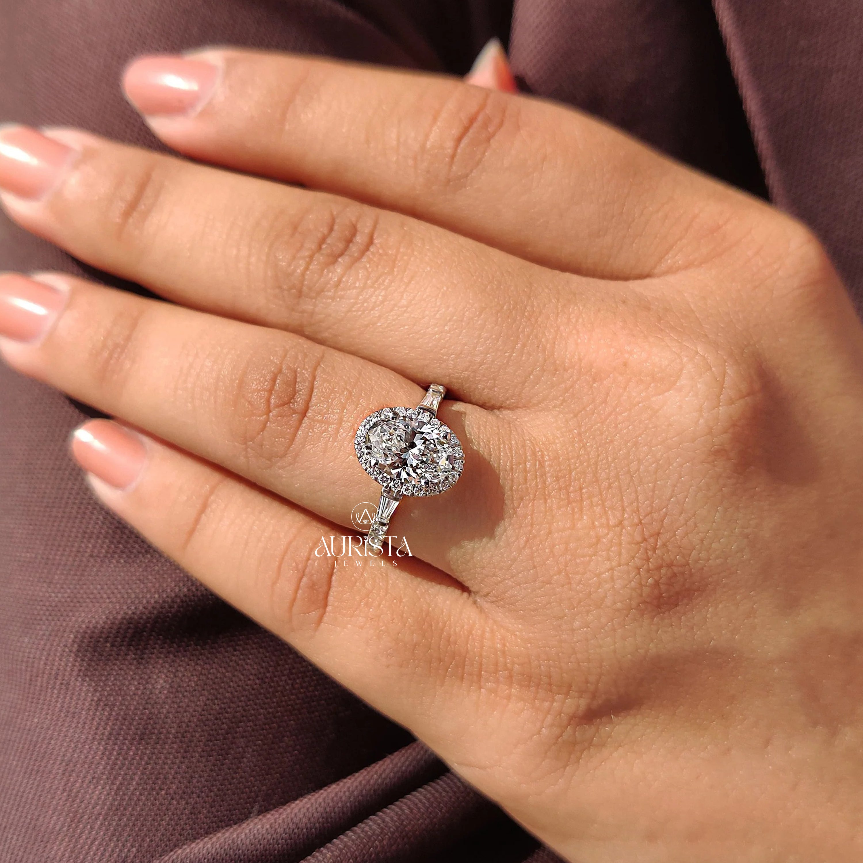 Oval Cut Diamond Ring with Baguette Side Stones