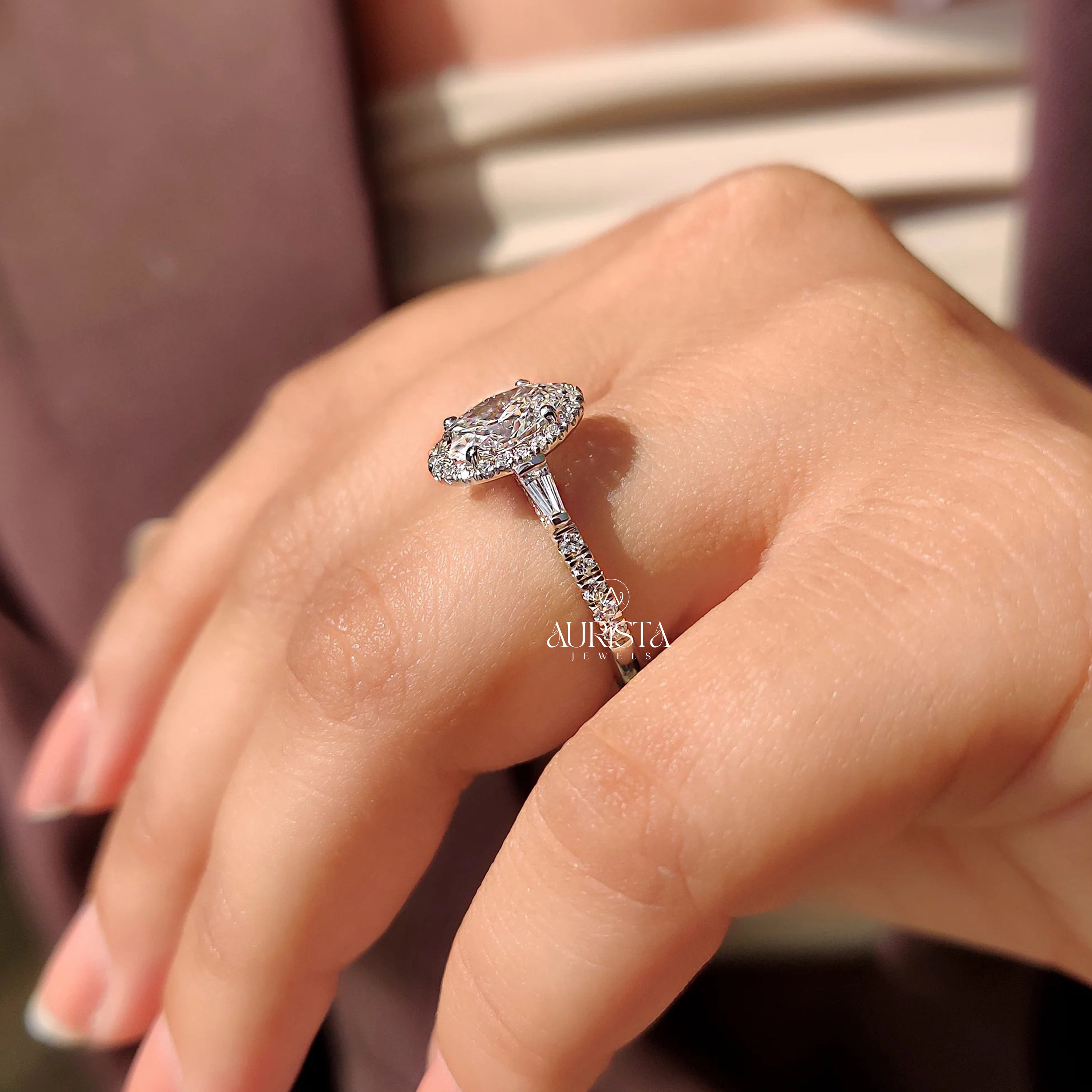 Oval Cut Diamond Ring with Baguette Side Stones