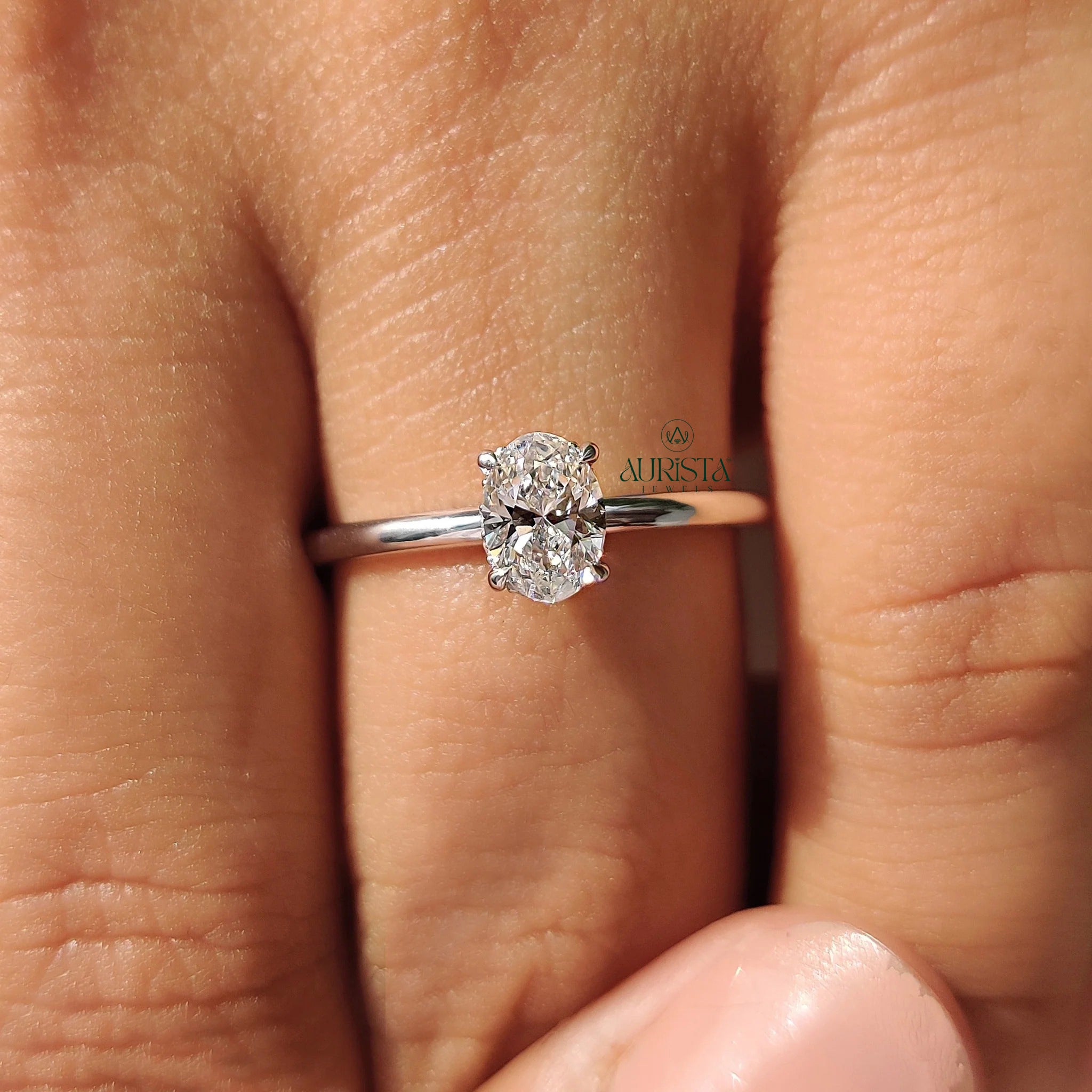 Oval Cut Diamond Four Prong Solitaire Ring with Hidden Halo