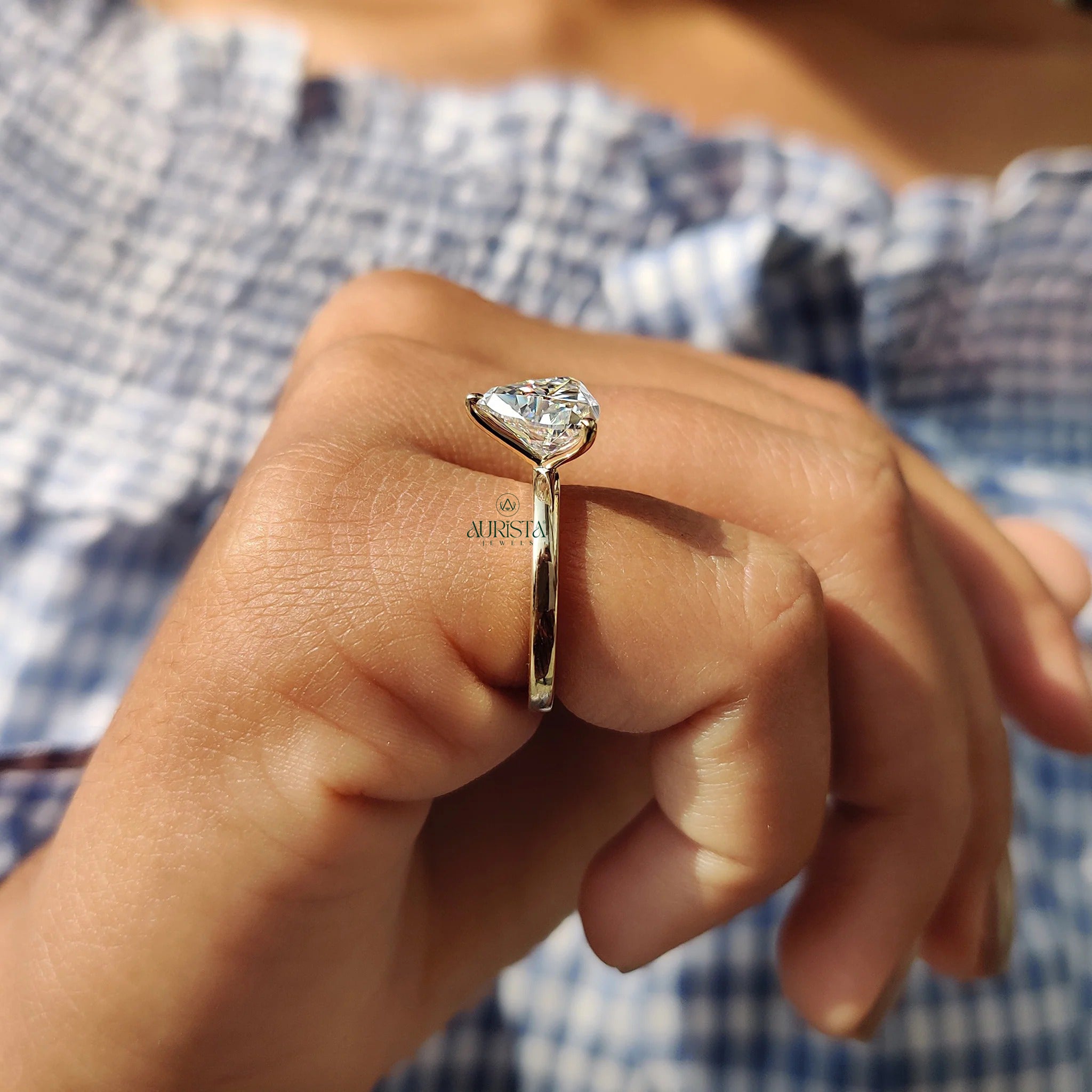 Trillion Cut Moissanite Solitaire Engagement Ring in Polished Yellow Gold Band