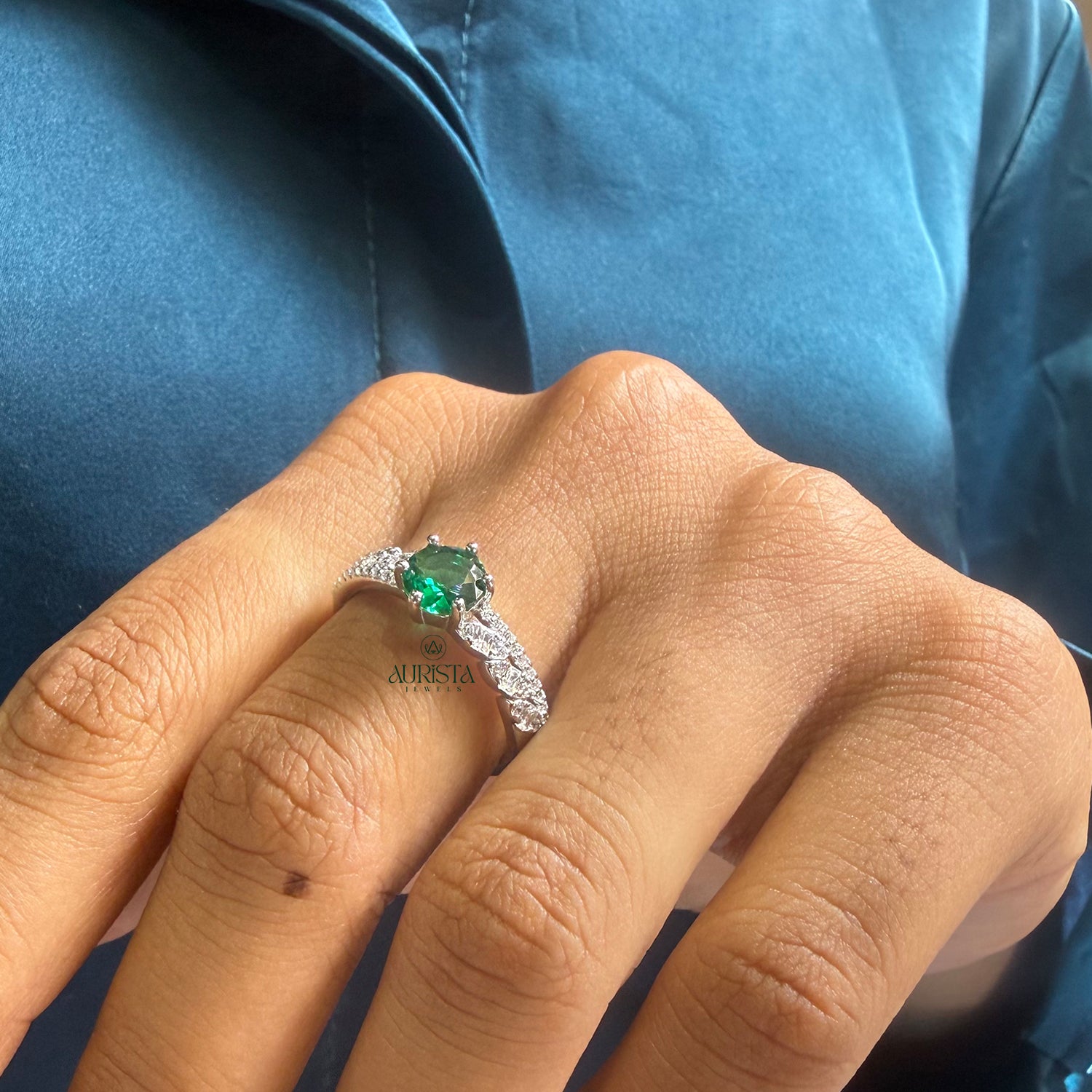 Leaf Design Ring Featuring a Green Center Stone and Sparkling White Moissanite