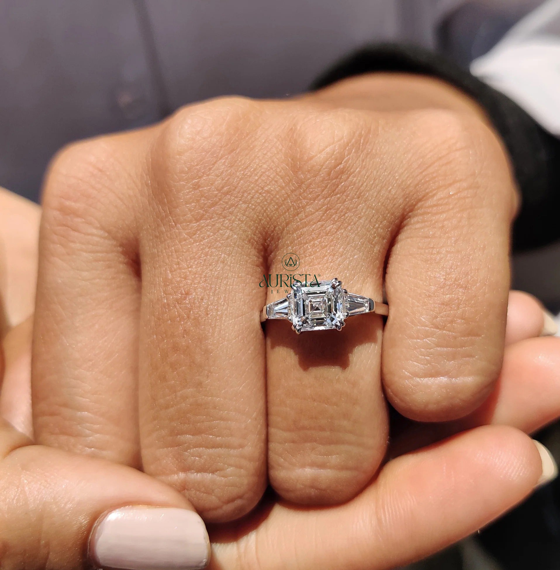 Asscher Cut Center with Tapered Baguette Side Stones