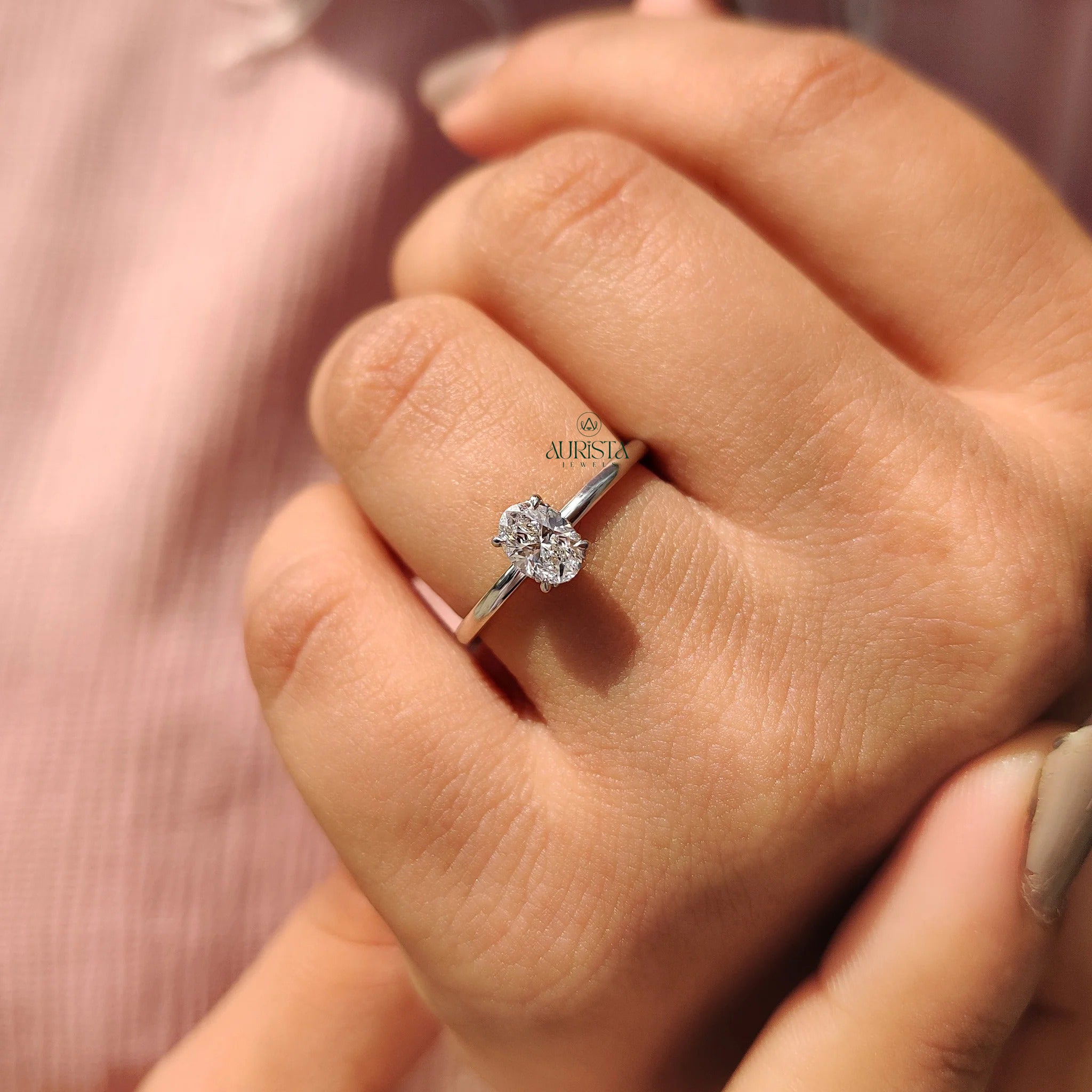 Oval Cut Diamond Four Prong Solitaire Ring with Hidden Halo
