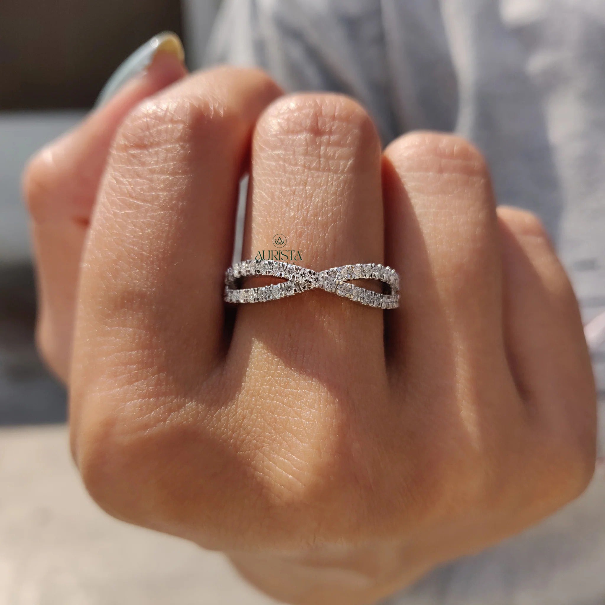 Moissanite and Diamond Crisscross Pave Wedding Band in Polished White Gold Finish