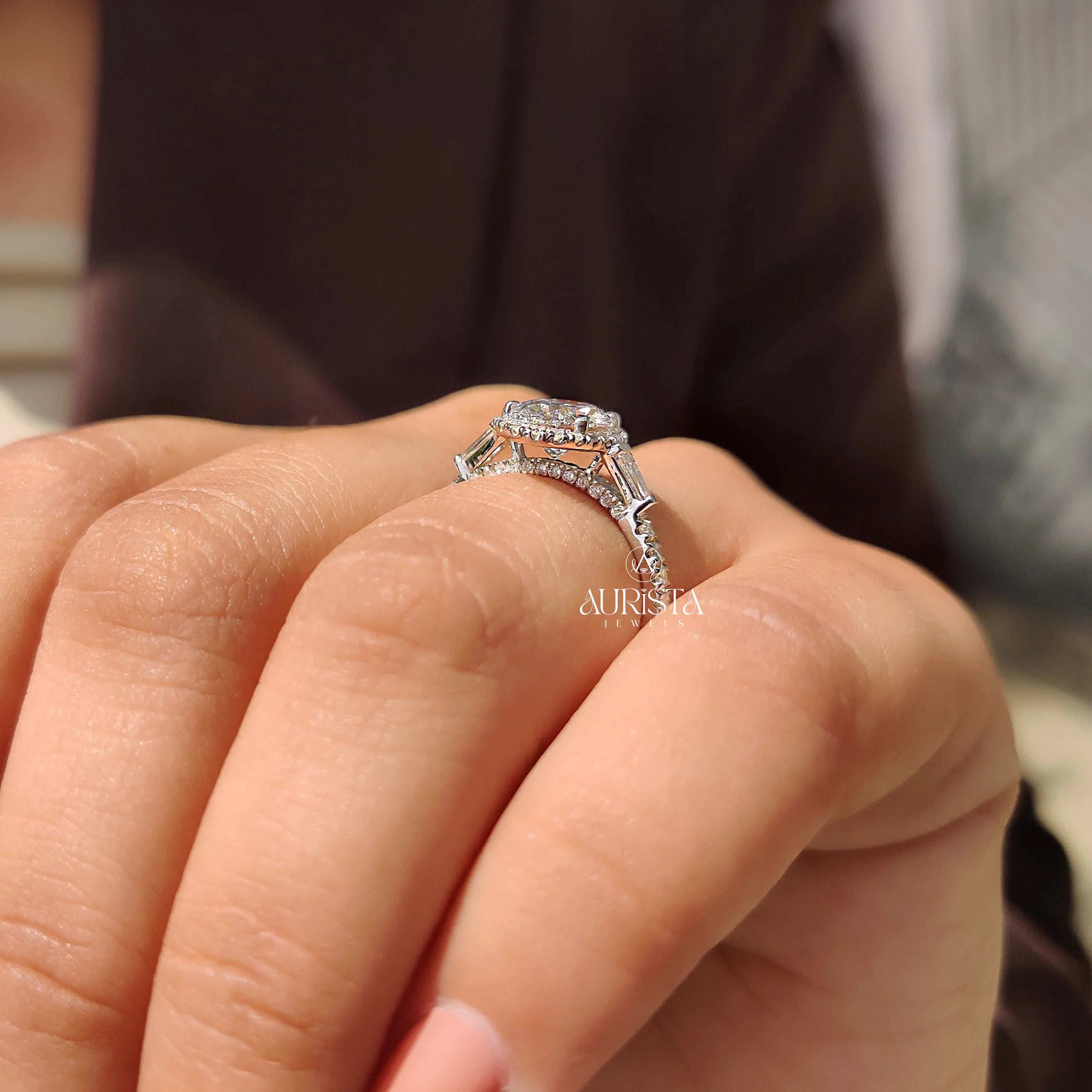 Oval Cut Diamond Ring with Baguette Side Stones