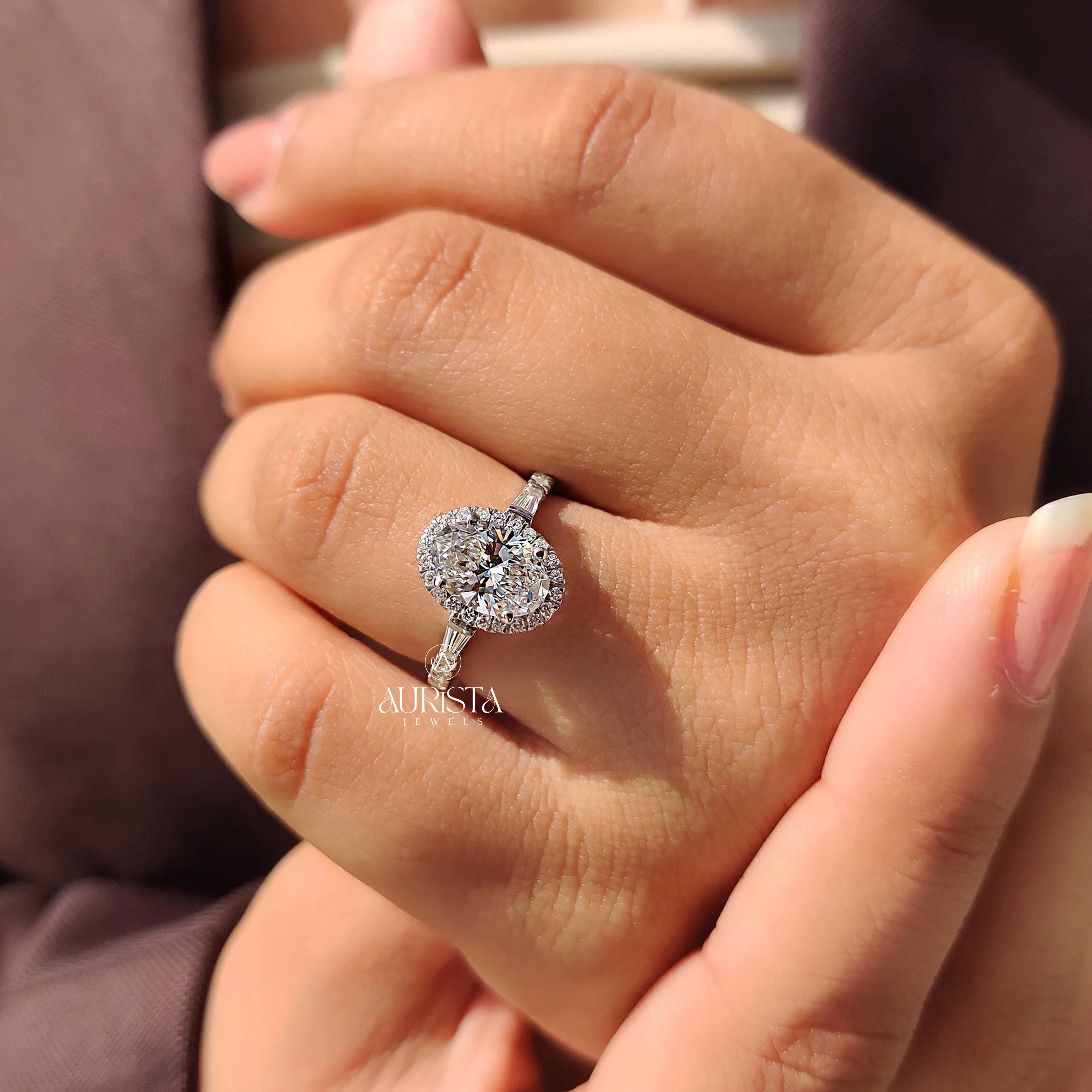 Oval Cut Diamond Ring with Baguette Side Stones