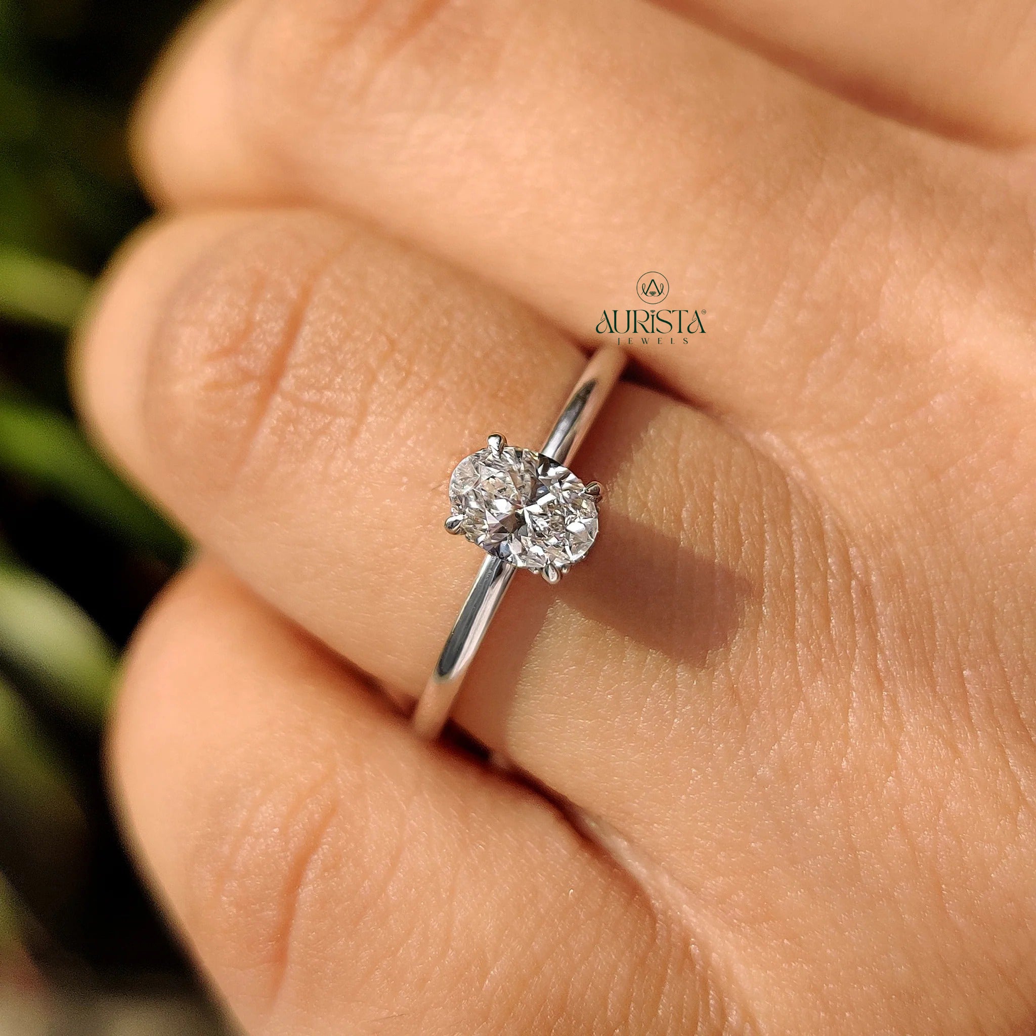Oval Cut Diamond Four Prong Solitaire Ring with Hidden Halo