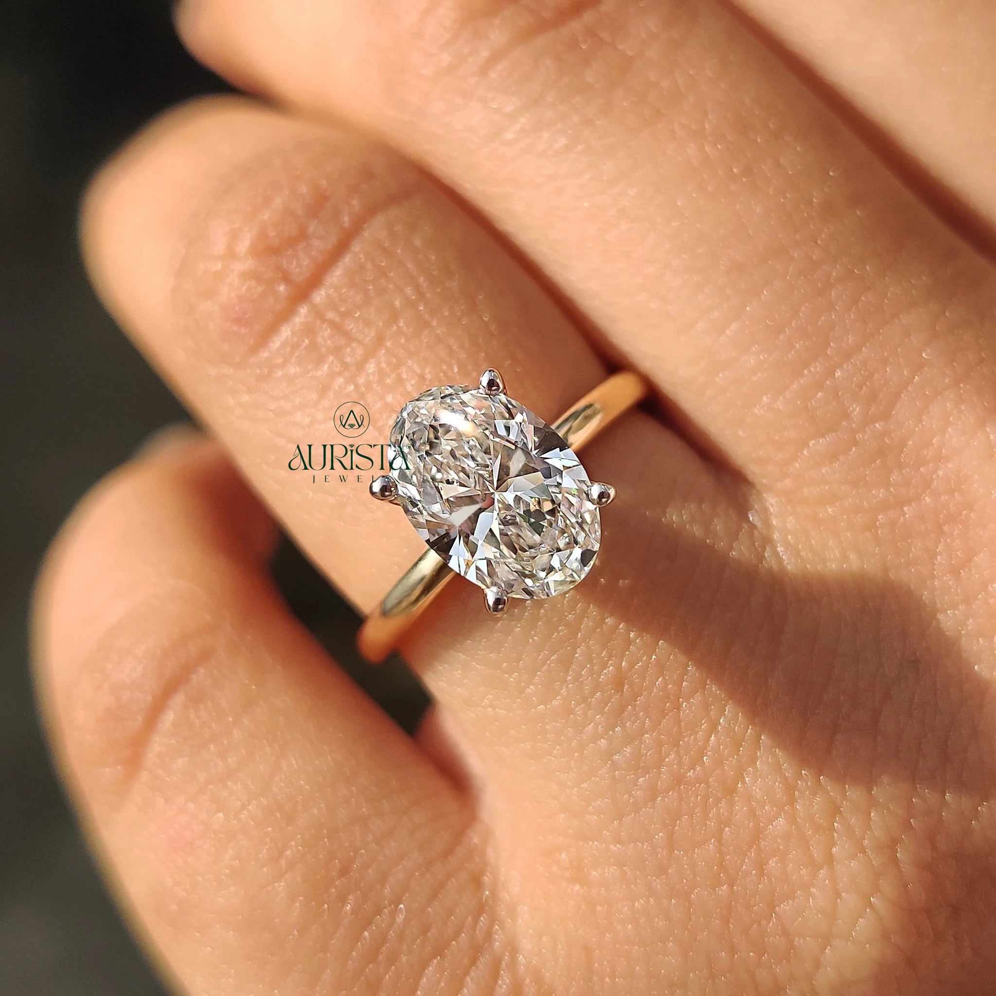 Oval Cut Diamond Solitaire Ring with Hidden Halo