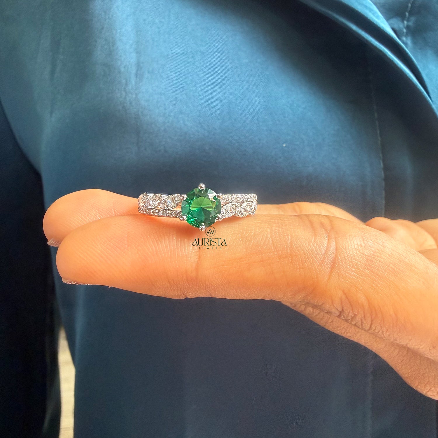 Leaf Design Ring Featuring a Green Center Stone and Sparkling White Moissanite
