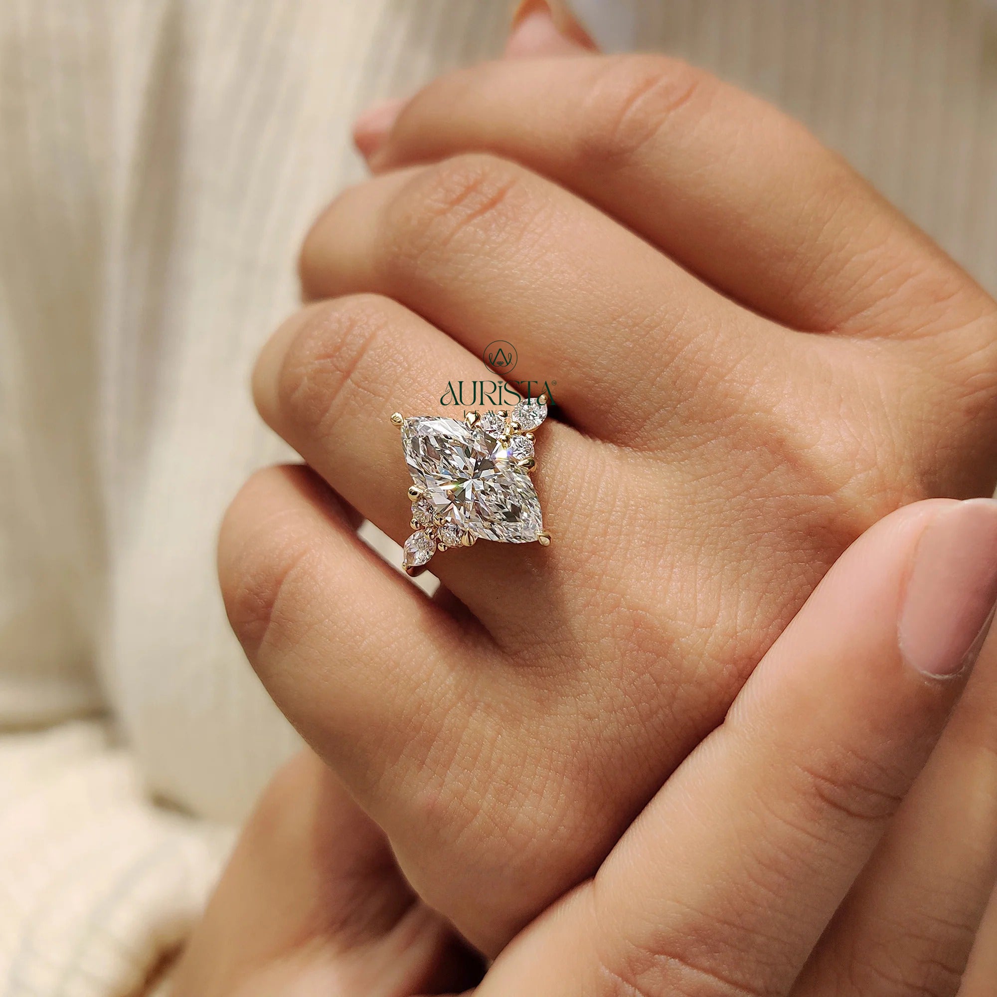 Marquise Cut Diamond Ring with Royal Cluster Side Stones