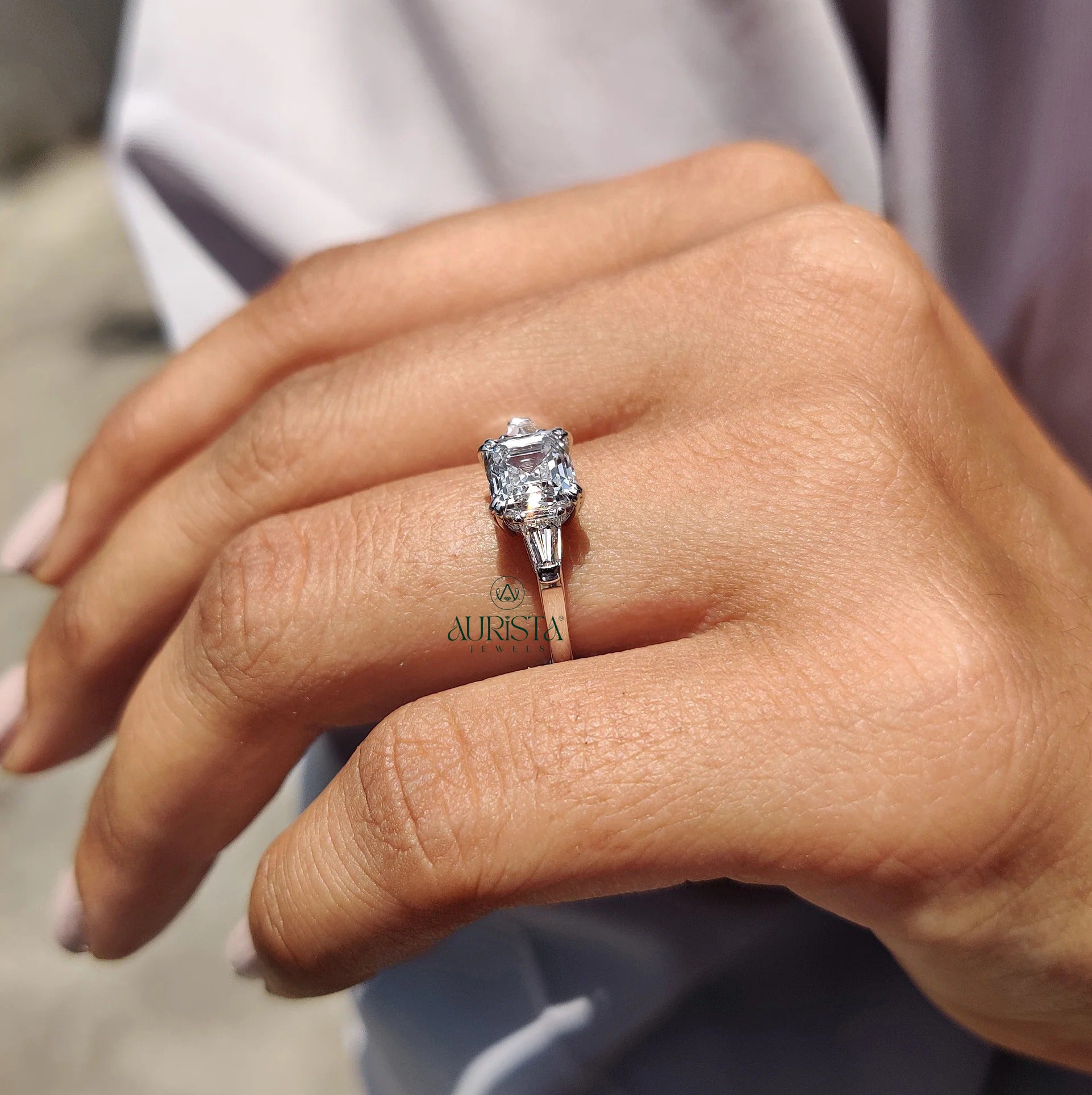 Asscher Cut Center with Tapered Baguette Side Stones