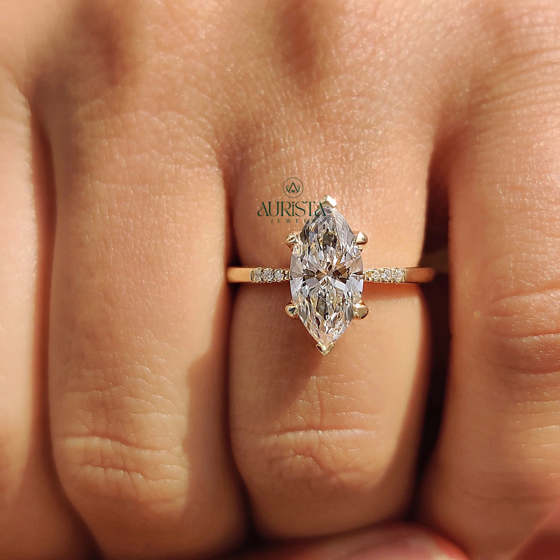 Marquise Cut Diamond Ring with Pave Side Stones