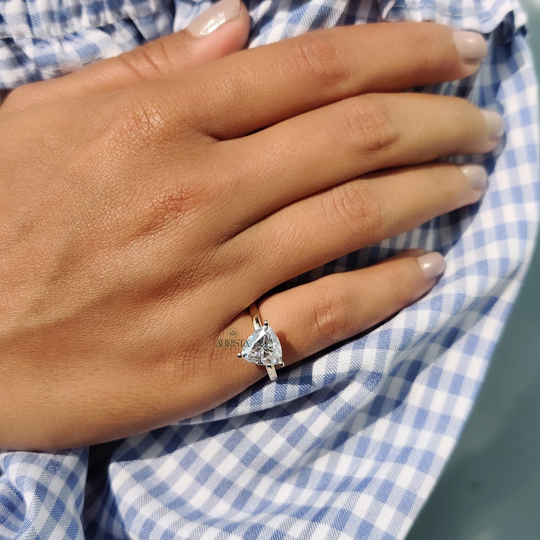 Trillion Cut Moissanite Solitaire Engagement Ring in Polished Yellow Gold Band