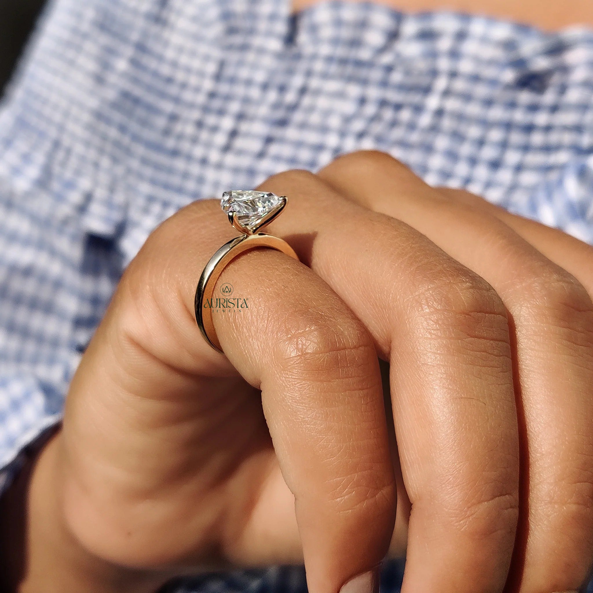 Trillion Cut Moissanite Solitaire Engagement Ring in Polished Yellow Gold Band