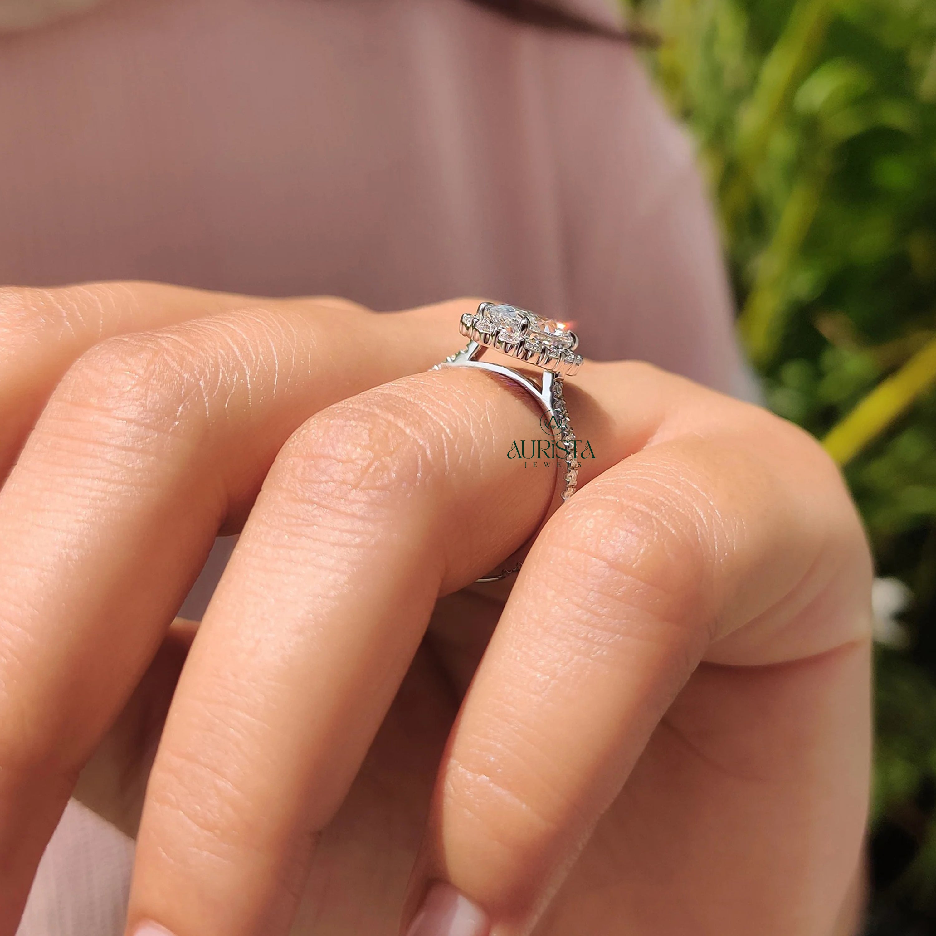 Oval Cut Diamond Halo Ring with Twisted Infinity Band