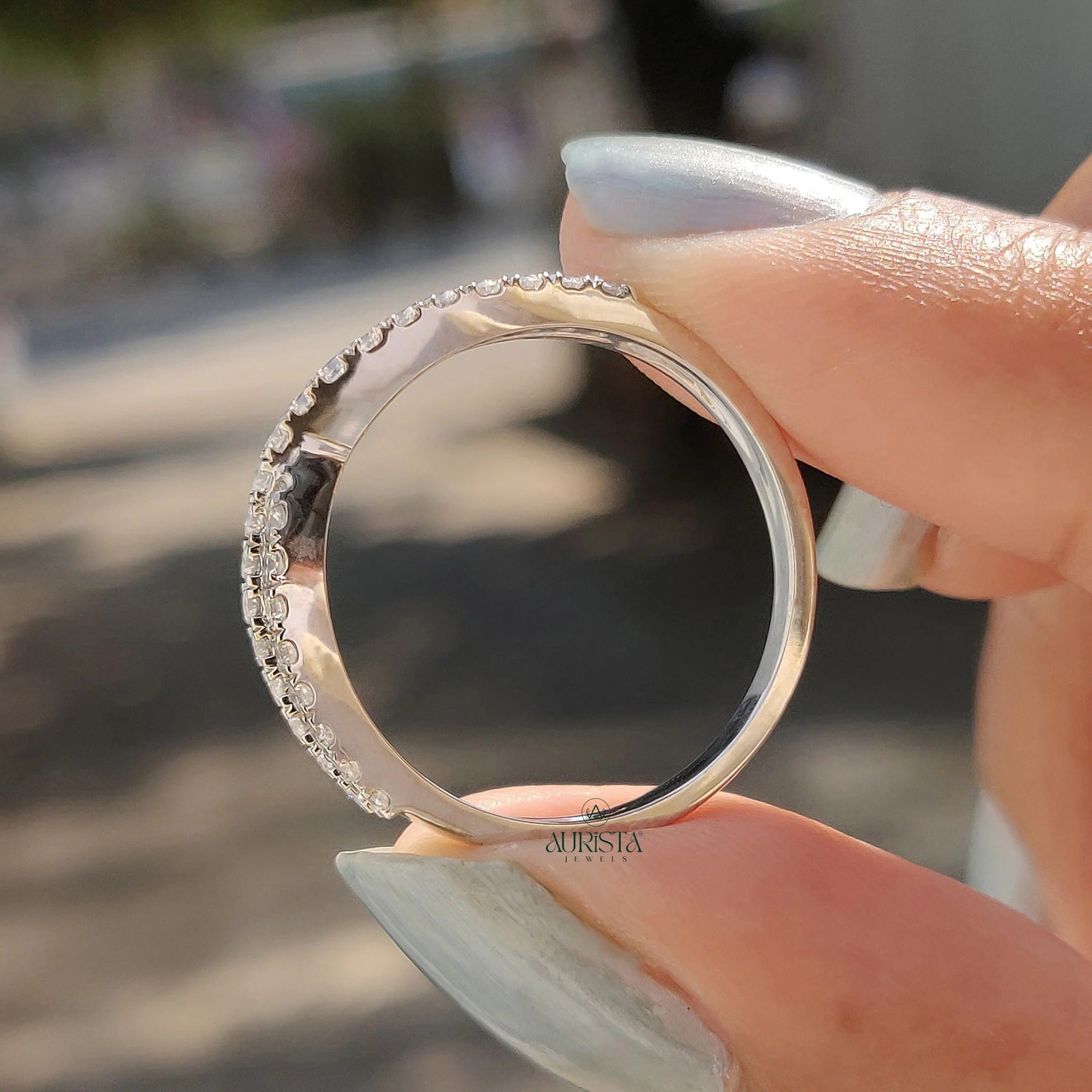 Moissanite and Diamond Crisscross Pave Wedding Band in Polished White Gold Finish