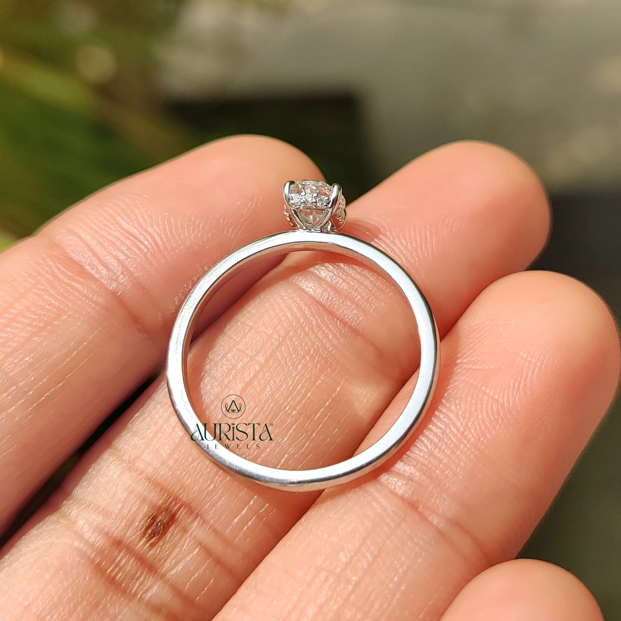 Oval Cut Diamond Four Prong Solitaire Ring with Hidden Halo
