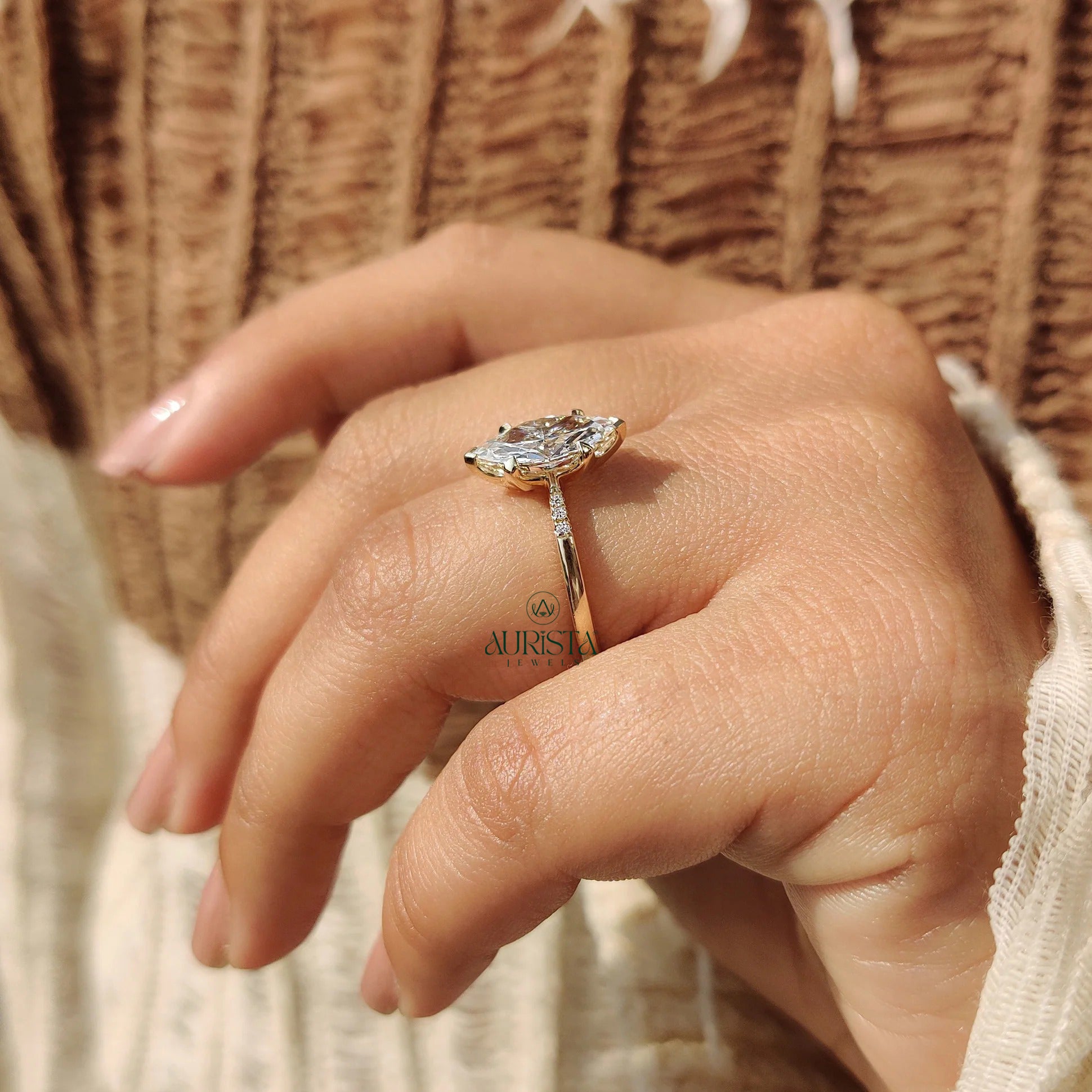 Marquise Cut Diamond Ring with Pave Side Stones