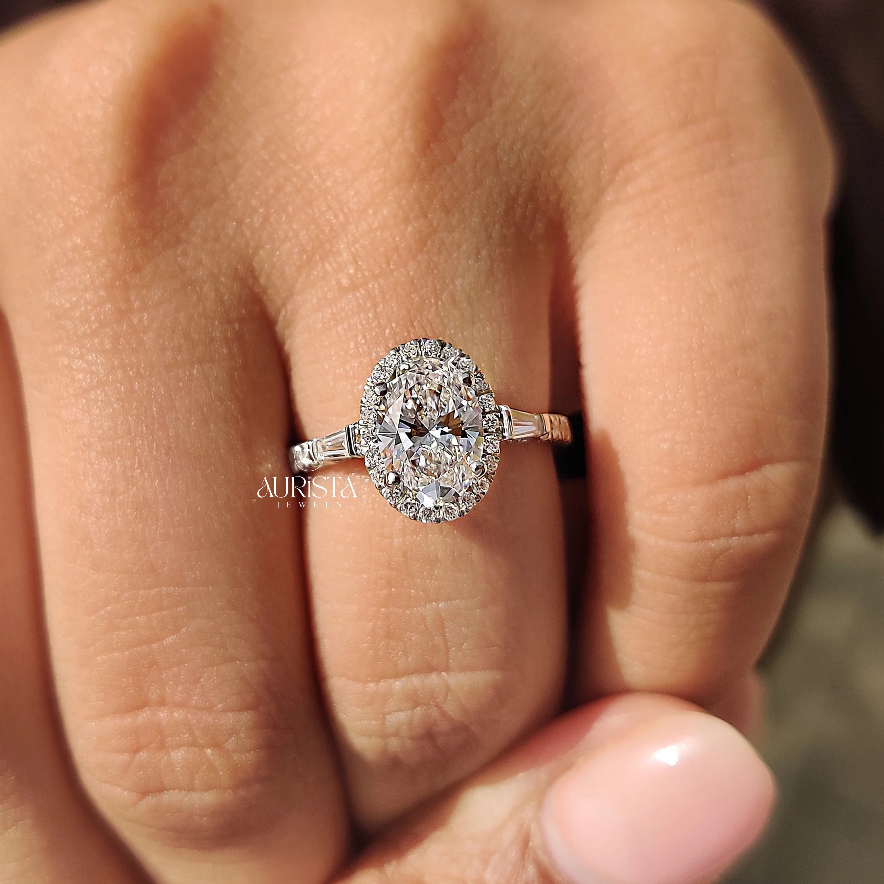 Oval Cut Diamond Ring with Baguette Side Stones