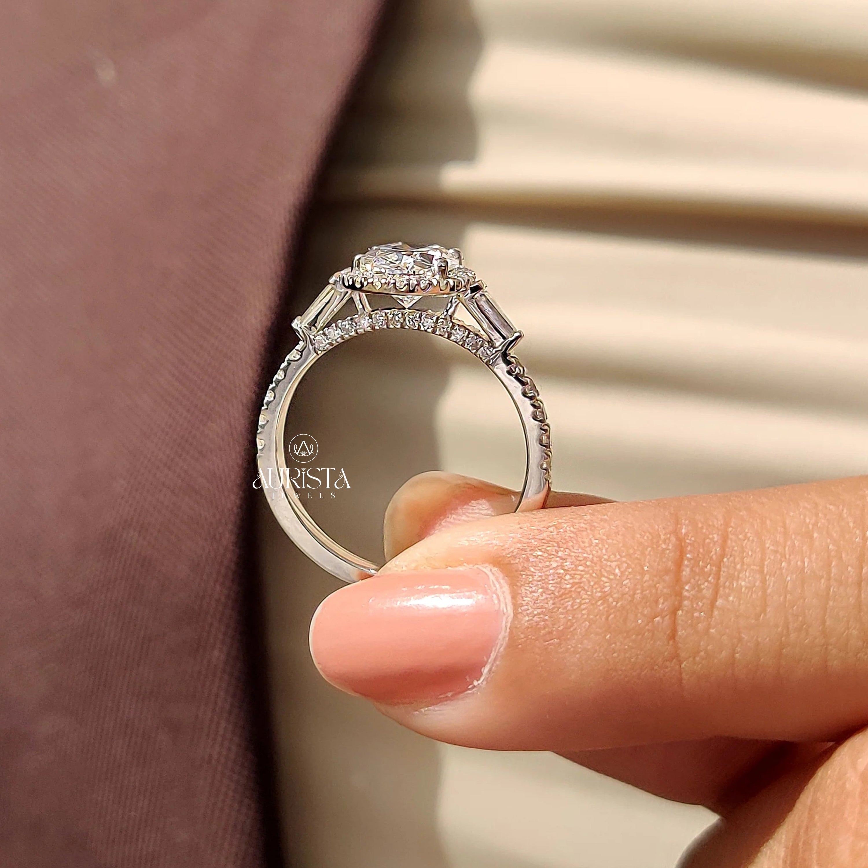 Oval Cut Diamond Ring with Baguette Side Stones