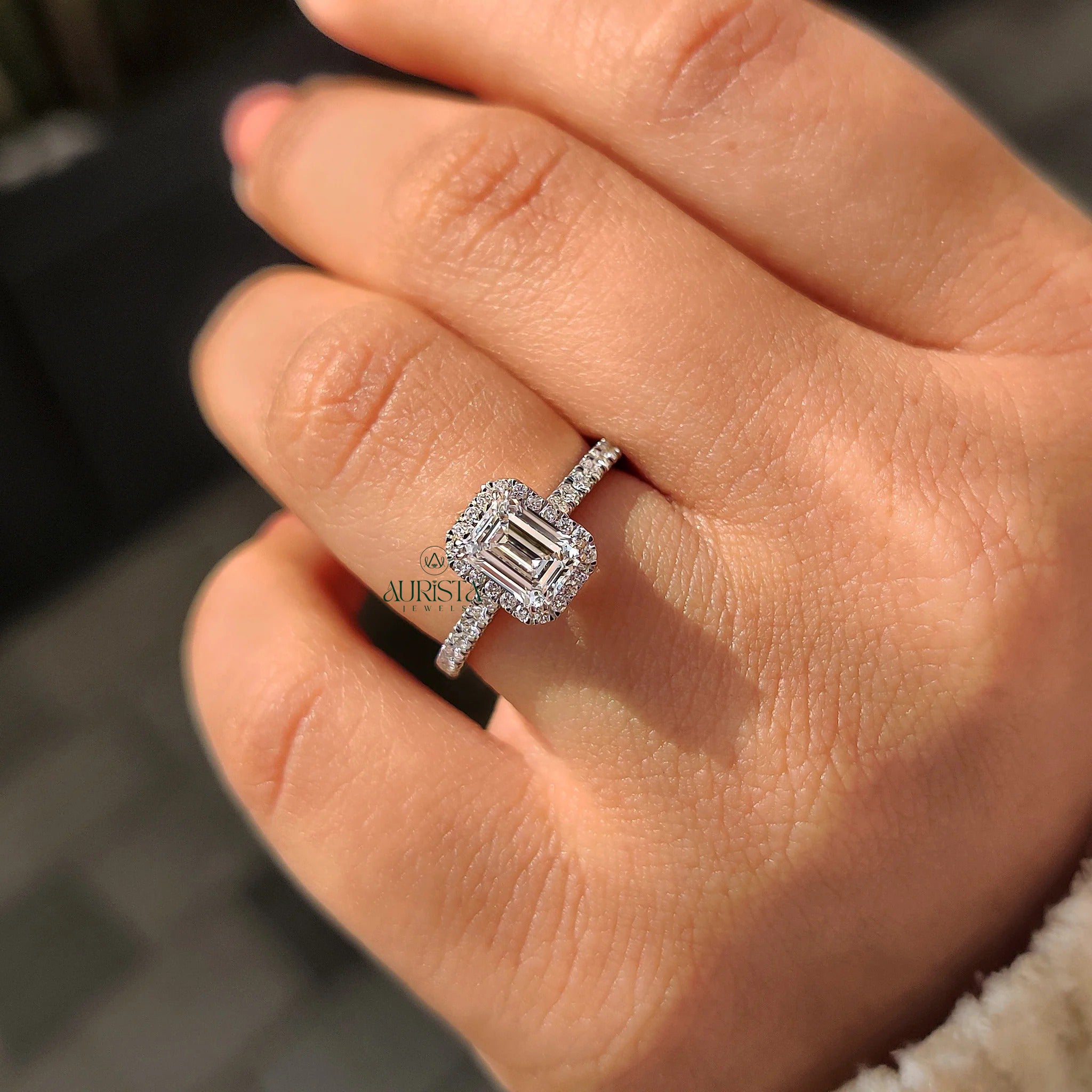 Emerald Cut Brilliant Stone Ring with Sparkling Halo