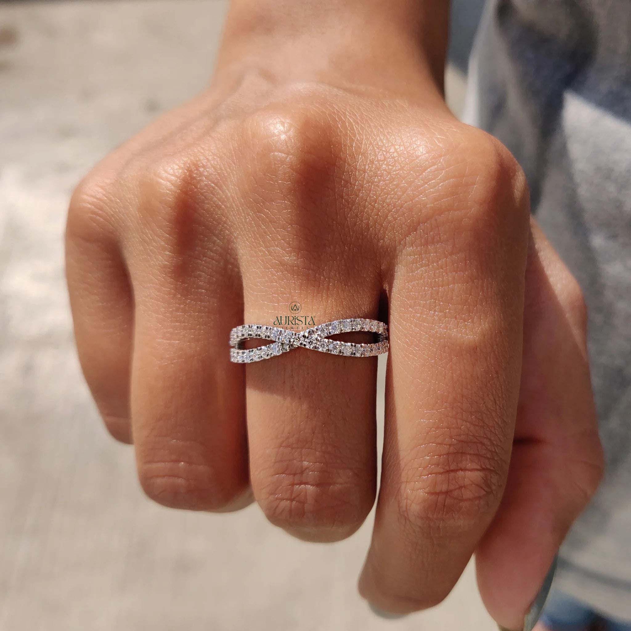 Moissanite and Diamond Crisscross Pave Wedding Band in Polished White Gold Finish