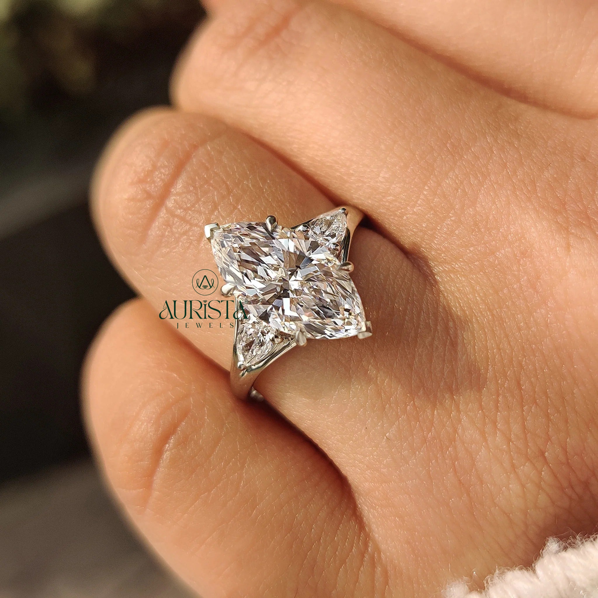 Marquise Cut Three Stone Diamond Ring with Pear Side Stones