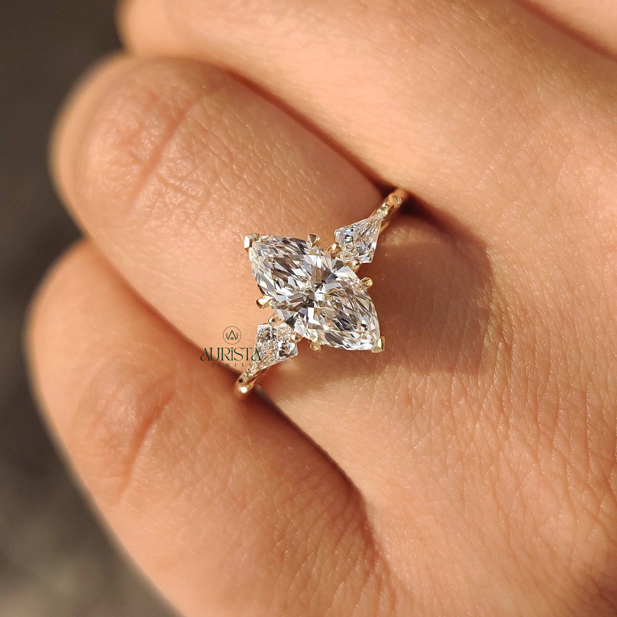Celestia Marquise Cut Three Stone  with Pear Side Stones